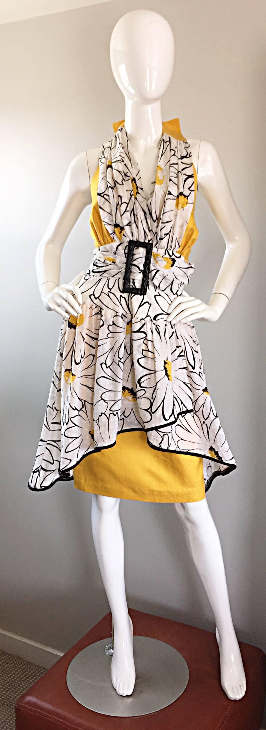 Beautiful vintage 1980s STEFANOS by STEPHAN CARAS Avant Garde halter dress! Caras pieces are very sought after and rare to come by! Features a wonderful print of op-art white daisies throughout. Yellow textured silk with a light cotton printed