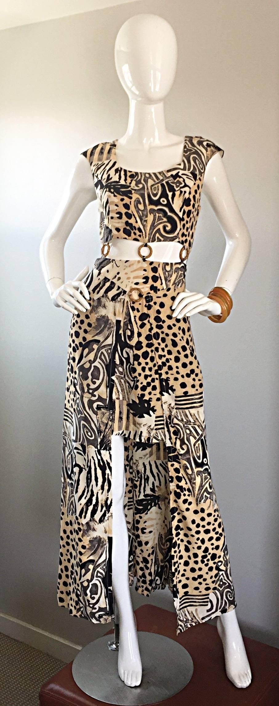 Incredible 90s vintage boho dress by Joseph Ribkoff! Wonderful animal leopard print, mixed with tribal prints in tan, taupe, brown and black. Round bamboo rings at cut-out waist. Features a mini skirt with a long train in the back. Words cannot even