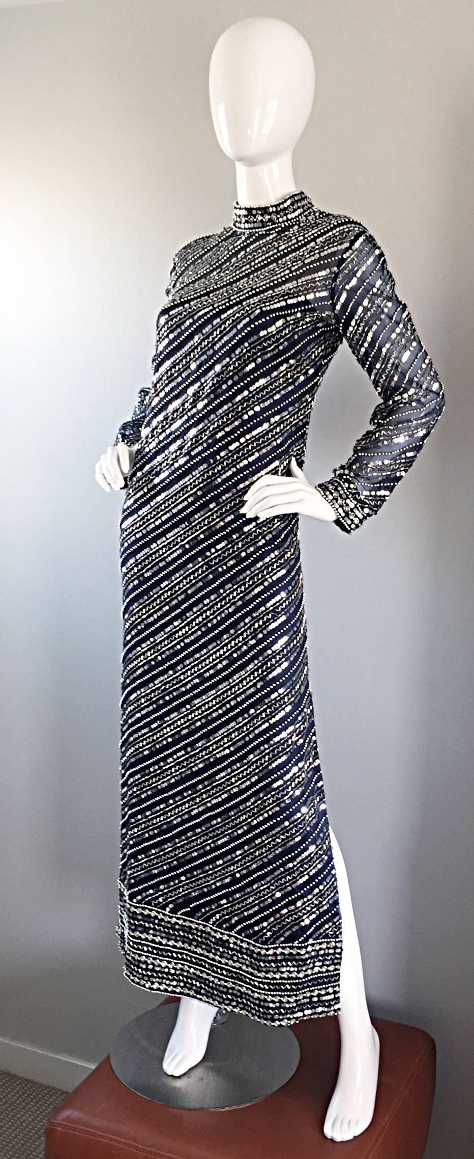 Extraordinary vintage 60s BILL TICE for MALCOLM STARR navy blue silk dress! Encrusted with thousands of hand-sewn sequins, beads and rhinestones throughout. Vertically sewn beadwork in vertical slanted lines make for a super slimming effect. Semi