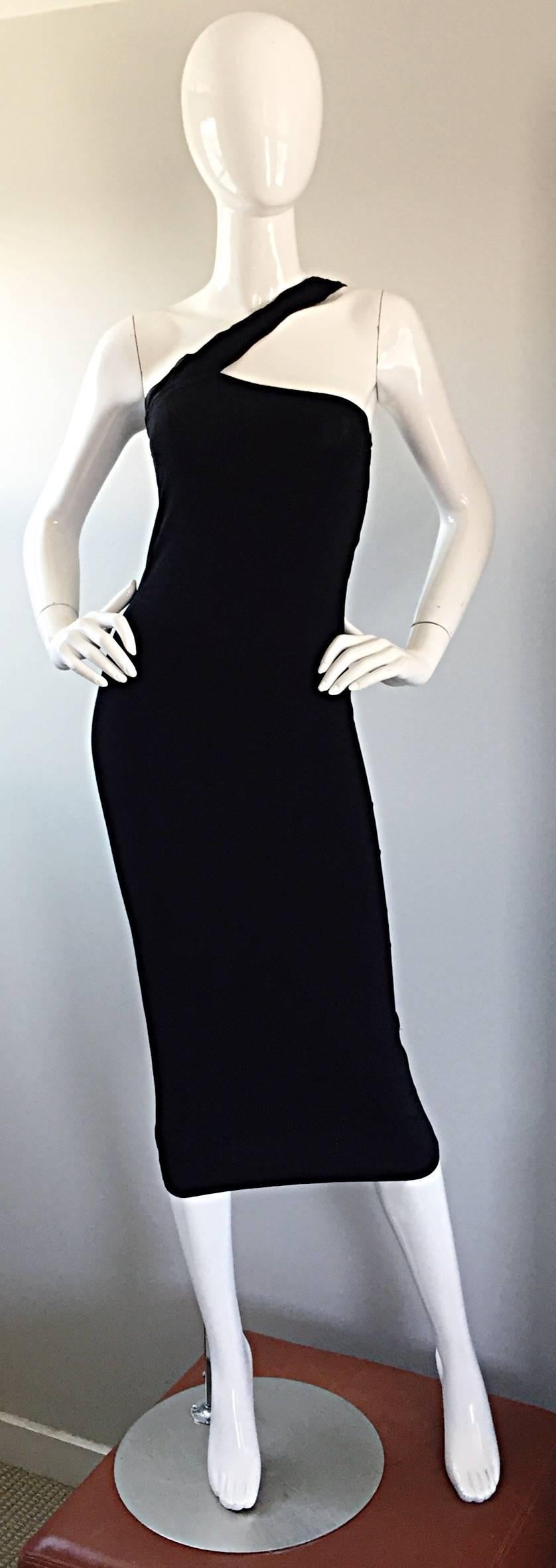 Incredibly sexy 1990s vintage ROMEO GIGLI black rayon jersey one-shoulder dress! Amazing bodcon fit that stretches to fit and hug the body in all the right places. Perfect below the knee hem. Important early 90s work from a master designer, whose