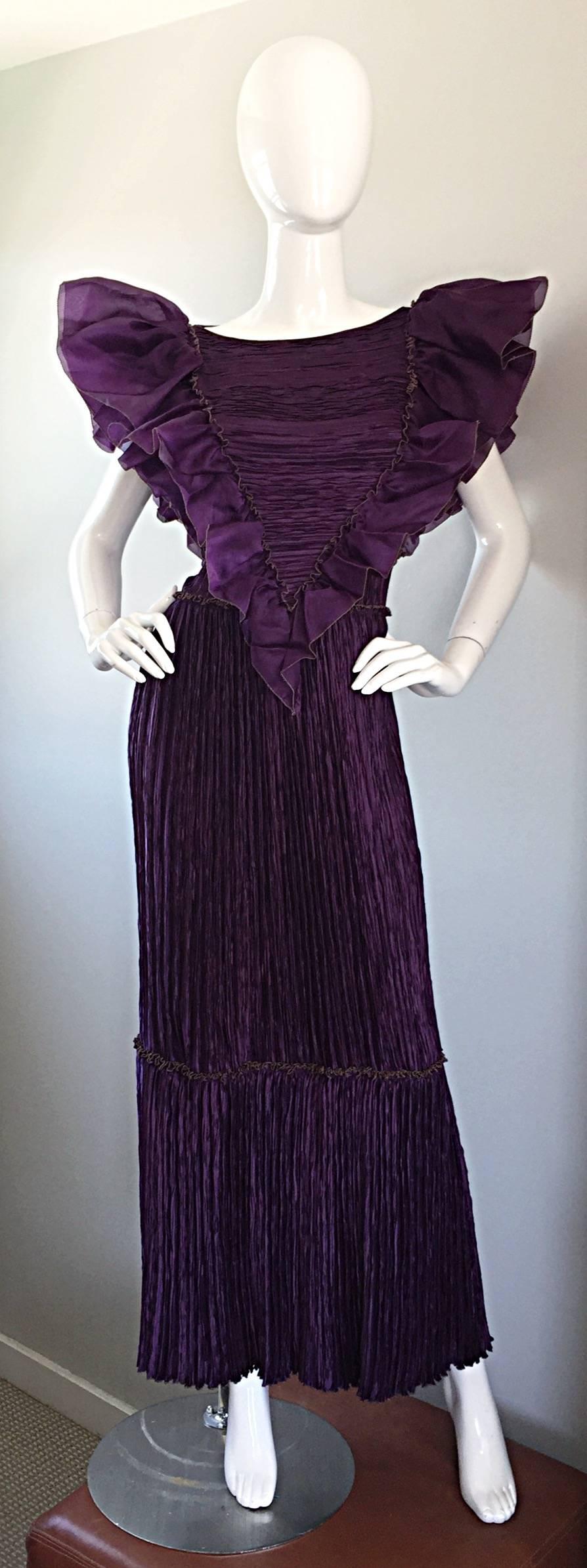 Amazing vintage 1980s MARY MCFADDEN, for BONWIT TELLER, purple eggplant Fortuny pleated silk gown! Features Avant Garde Ruffles at each shoulder, with gold silk thread at the edges. Accordion pleated skirt, with a slight trumpet hem. Hidden zipper