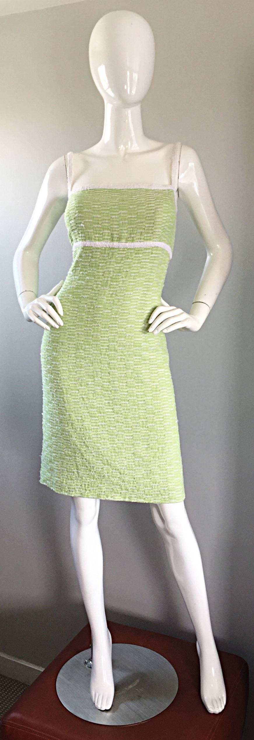 Incredibly flattering vintage late 90s (never worn) ESCADA pale green boucle dress! Marked Size 42, which translates to a US Size 12 - 14. Green and white boucle, with white trimmed bodice and shoulder straps. Looks amazing on, and was created with
