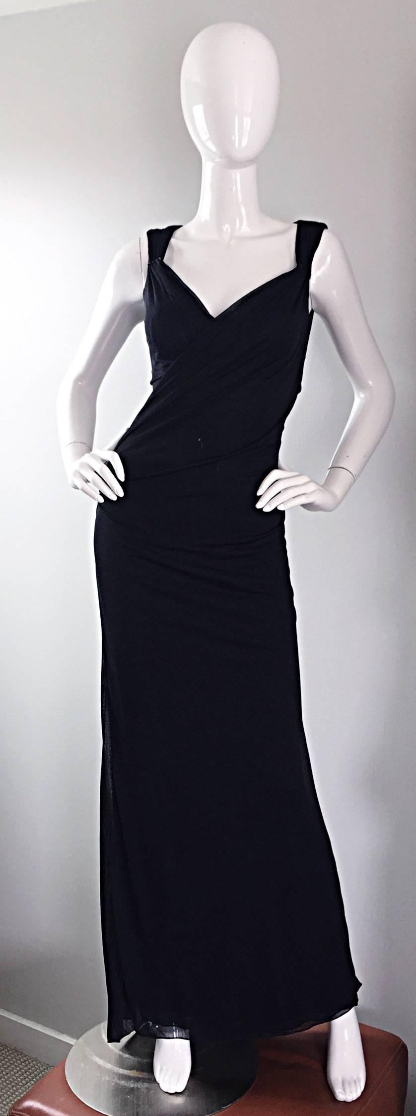 Sexy 1990s / 90s vintage RICHARD TYLER COUTURE black jersey evening gown, with flattering cut - out back. Hand-sewn black glass beads at shoulders. Ruching at front bodice is very slimming, and reveals just the right amount of cleavage. Exudes a
