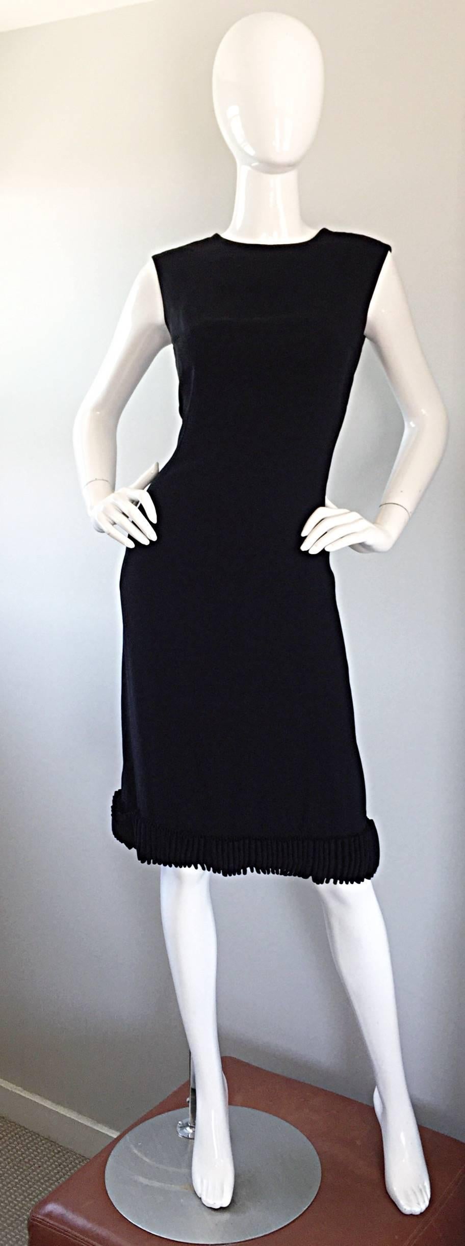 The perfect 60s little black vintage dress by SHANNON RODGERS! Insanely well made, with so much attention to detail! The perfect shift shape hugs the body in all the right places. Ribbon ruffle hem is a signature Rogers trait--She always produces