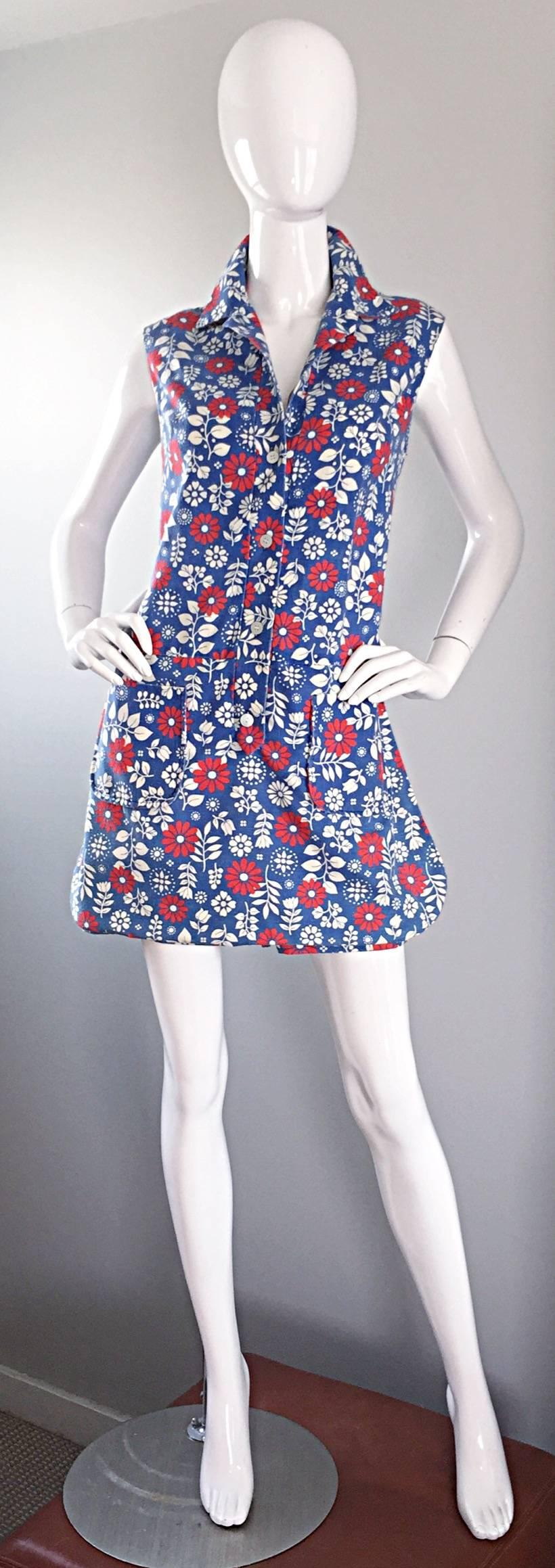 Rare and super adorable vintage 60s ABERCROMBIE & FITCH cotton romper / onesie / jumpsuit with attached skort! Buttons up the bodice. Cute red, white and blue printed flowers throughout. Looks so chic on! Great with sandals, flats, wedges or heels.