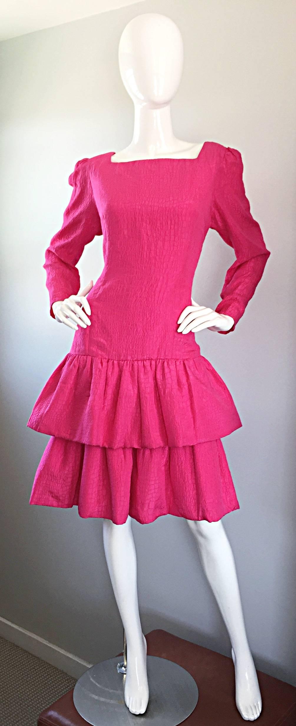 Stunning Vintage 1980s / 80s ADELE SIMPSON for NEIMAN MARCUS shocking hot pink silk alligator print dress! Flattering dropped waist with two tiers on the skirt. Hidden zipper up the back with hook-and-eye closure. Hidden interior weights on eigh