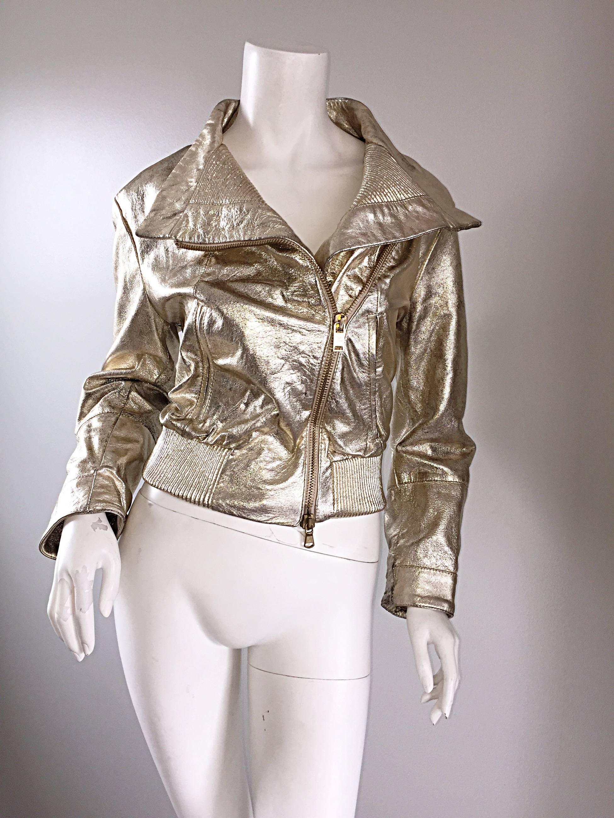 Amazing vintage GIANFRANCO FERRE gold leather distressed Moto jacket! Biker style with an edge. Asymmetrical closure that looks great done all the way up, half way, or left completely open with the sleeves scrunched up. Fully lined in silk. Heavy