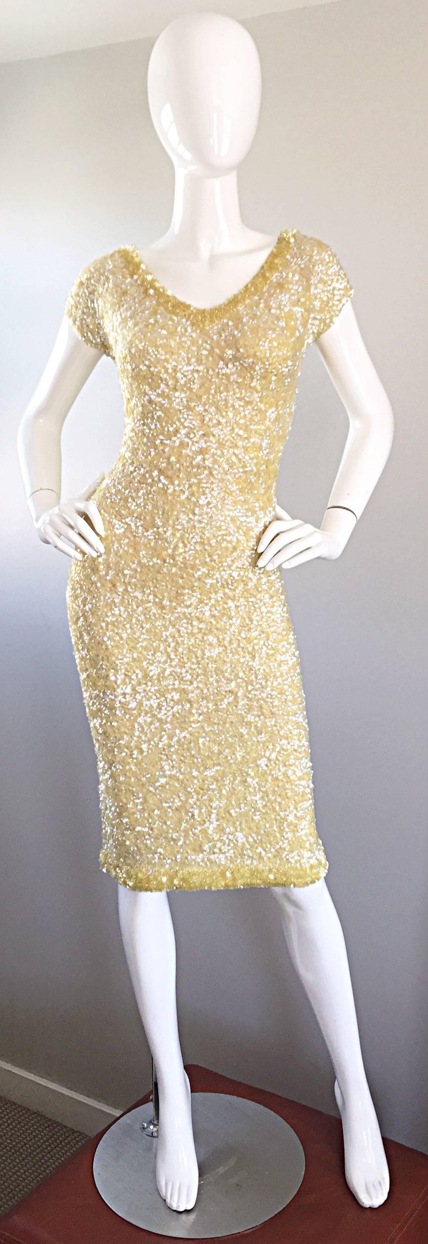 Extraordinary 1950s GENE SHELLY'S light yellow sequined wiggle wool dress! Bombshell fit that hugs the body in all the right places. Thousands and thousands of hand sewn iridescent sequins and paillettes throughout the entire dress! Plunging back