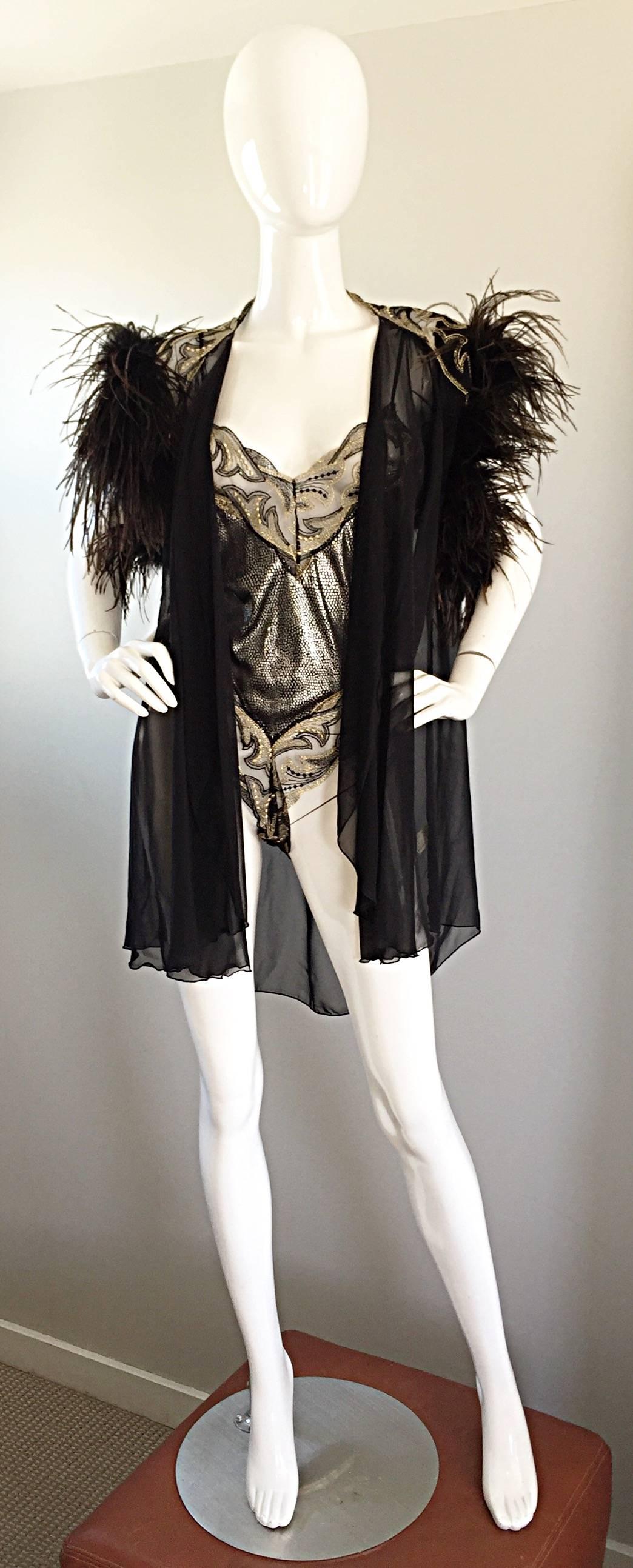 Incredible rare vintage early 80s BOB MACKIE for Elizabeth Arden teddy / bodysuit and chiffon vest, with hand-sewn ostrich feathers at the sleeves! Hollywood glamour at its finest! Sexy high cut hips, with intricate lace details. Black, silver and