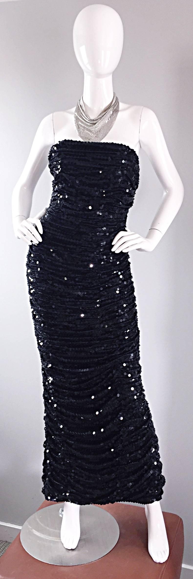 Stunning vintage OLEG CASSINI black strapless sequined evening dress! Features thousands of hand-sewn sequins throughout the entire dress. Flattering ruching detail that Cassini was known for. Simply sensational on the body. Slit up the center back