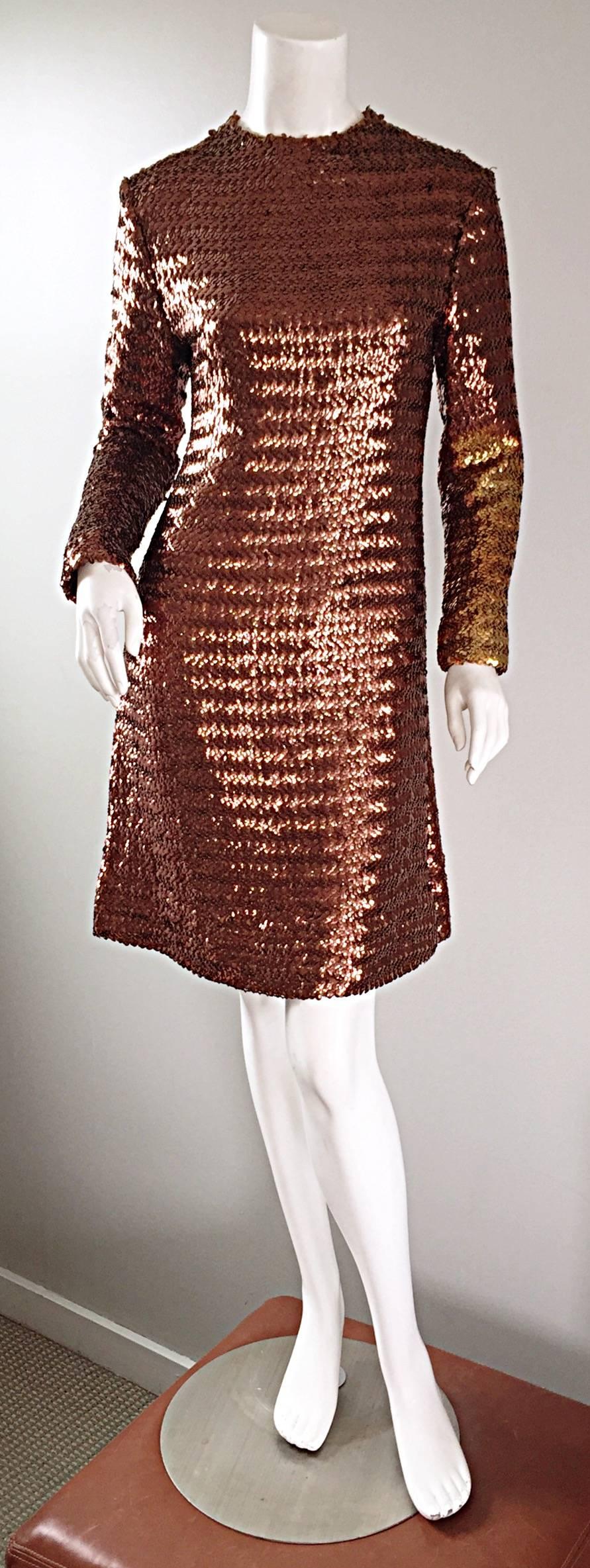 Amazing vintage 60s SUZY PERETTE fully sequined A - Line dress! Features thousands of hand-sewn bronze sequins, with an ombre gold sequined left sleeve. Flattering flared hem. Not only chic, but super comfortable! Wonderful tailored fit. Full metal