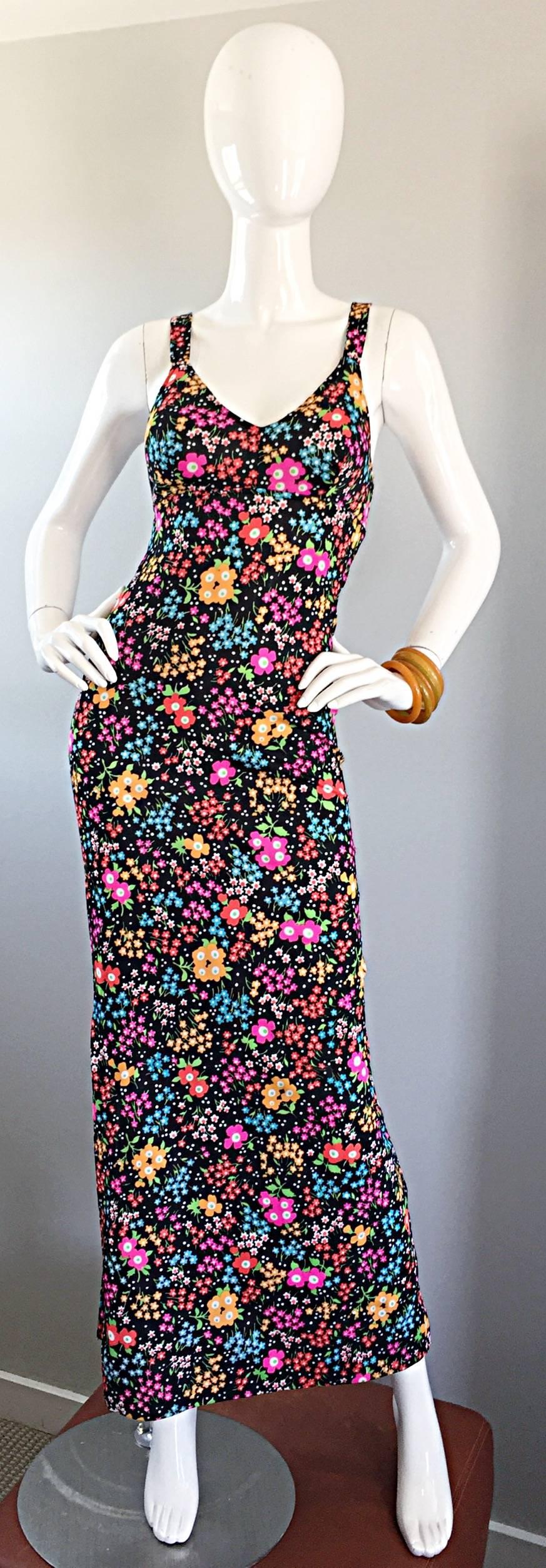 Insanely stylish JACK HARTLEY (of MIAMI) vintage 1970s fitted  jersey maxi dress! Features practically every color of the rainbow in a chic minimal floral print. Multiple back straps, with white plastic lucite center piece. Flattering v-cut bodice