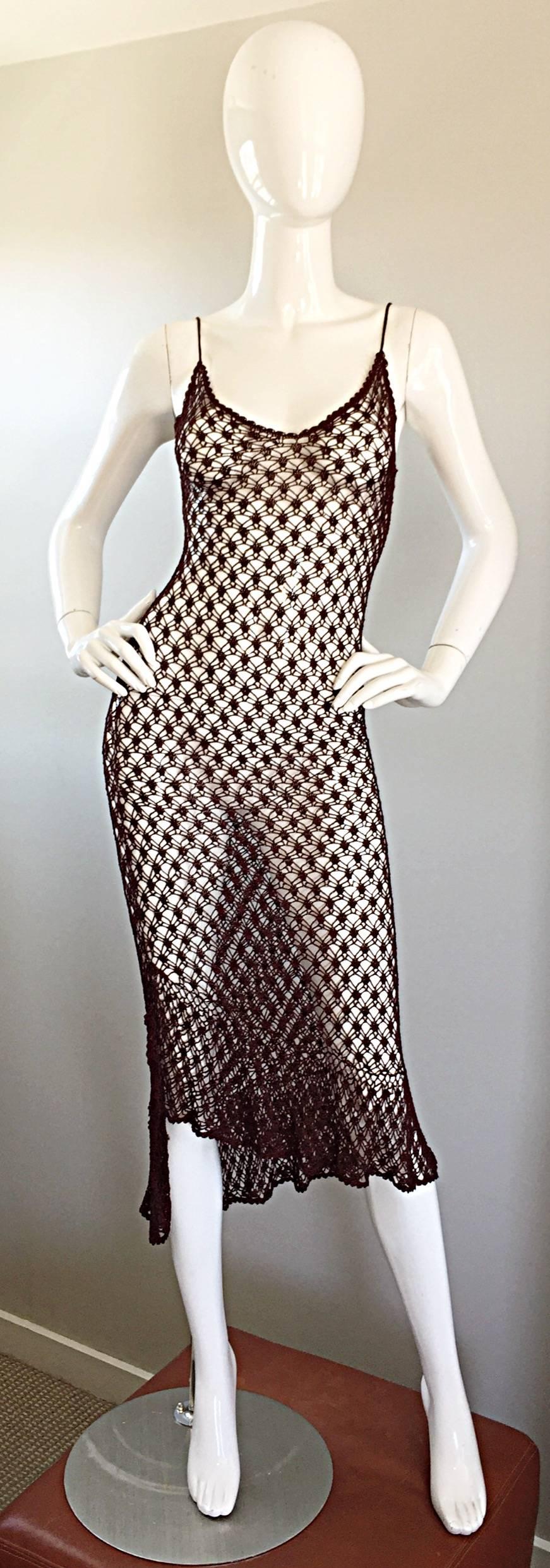 Sexy 1970s dark brown hand crochet silk and rayon blend hand-sewn crochet asymmetrical dress! Features an asymmetrical hem, with a high-low hem. Adjustable straps that feature slider hooks like a bra / bras to adjust length and bodice. Flattering