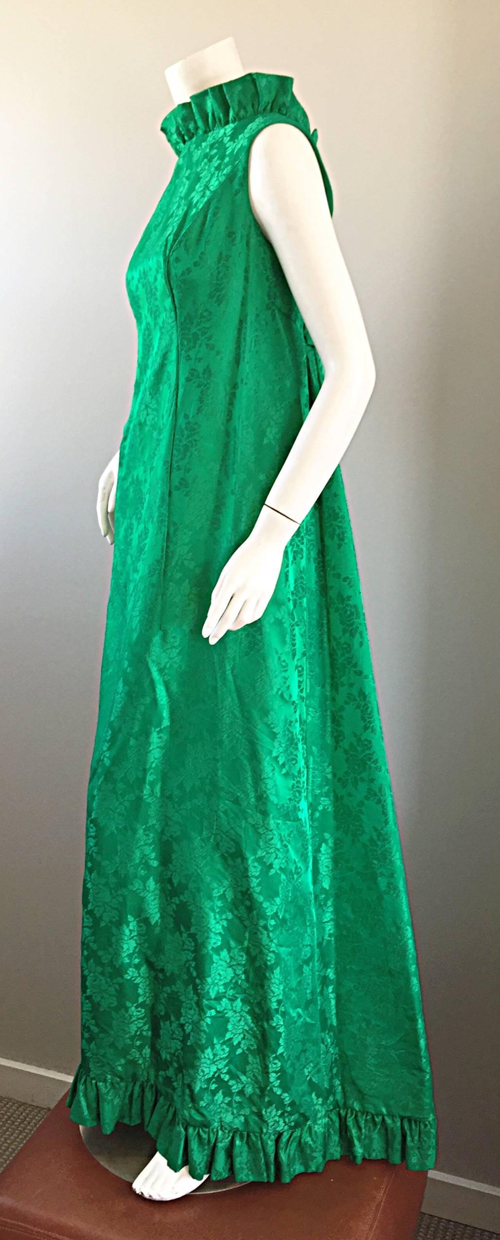 Exceptional and extremely rare 60s PRISCILLA OF BOSTON kelly green silk brocade evening dress, with attached train! Vibrant and beautiful green color, with an impressive floral brocade iridescent print. Ruffle high neck with a slight plunging back