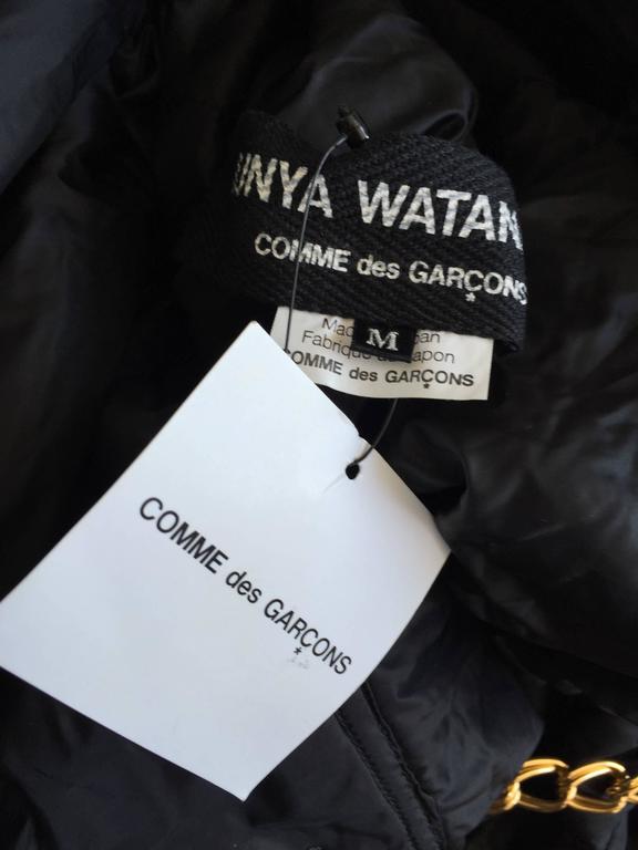 black and gold comme des garcons