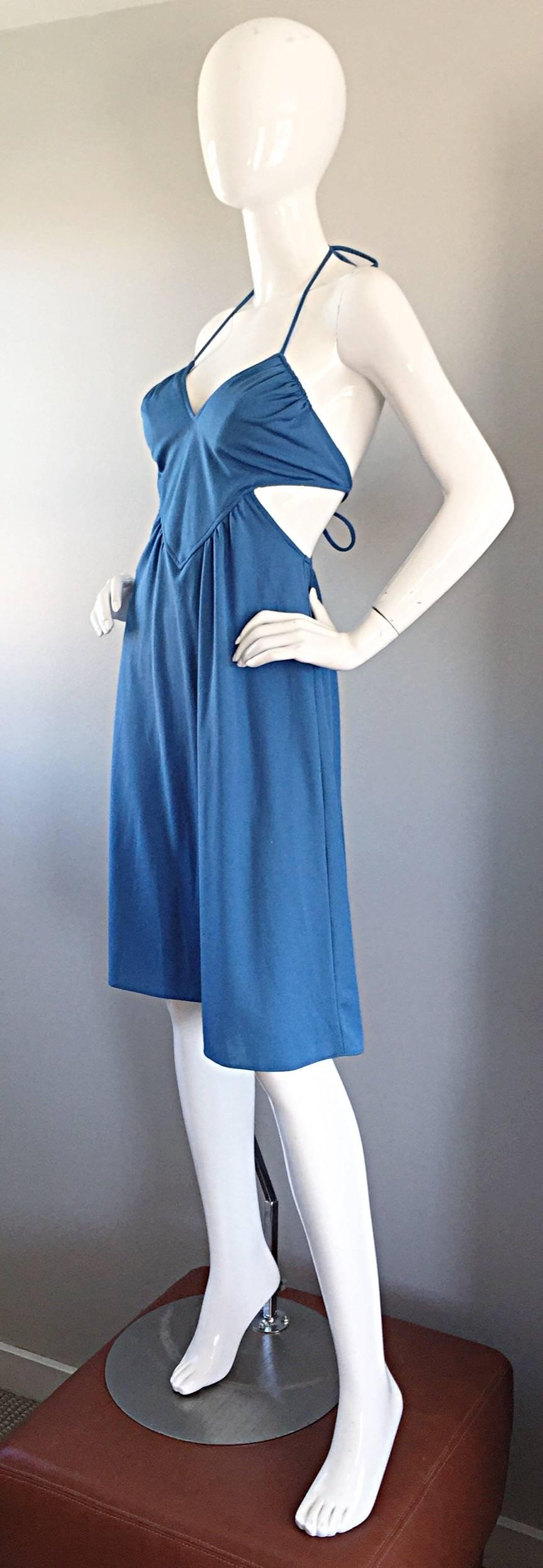 Sexy vintage 70s SAMIR robins egg blue cut-out dress! So much detail on this stretch jersey beauty! Heart shaped bust, with cut-out on each side of the waist. Ties at the back halter neck, and above the back waist. Looks amazing on, and can easily
