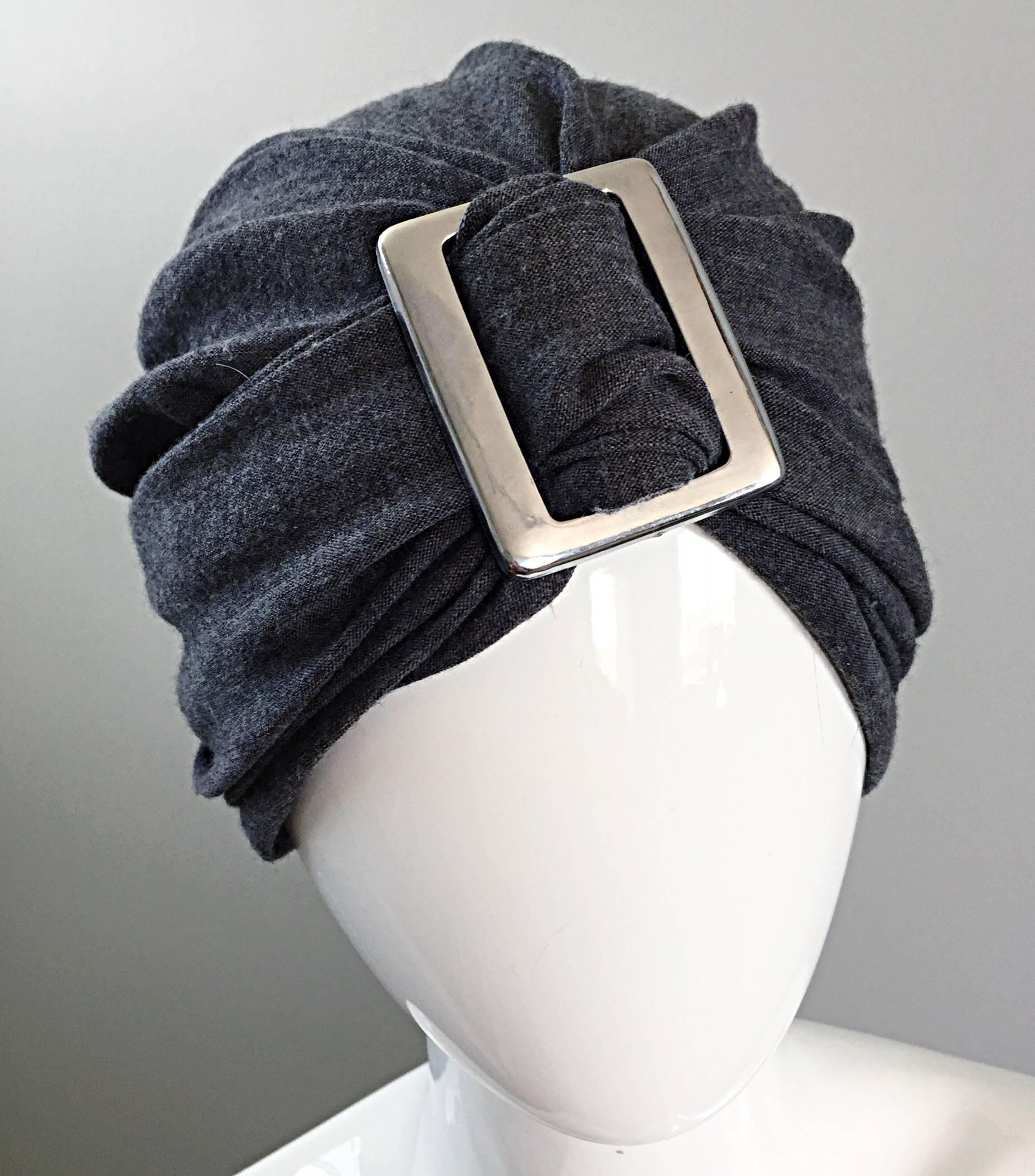 Awesome vintage 1960s CHRISTIAN DIOR for SAKS FIFTH AVENUE charcoal gray soft wool turban hat, with oversized silver metal buckle! Intricate pleating detail throughout. Stretches to fit any size head (Small - Large). Super versatile. Great with