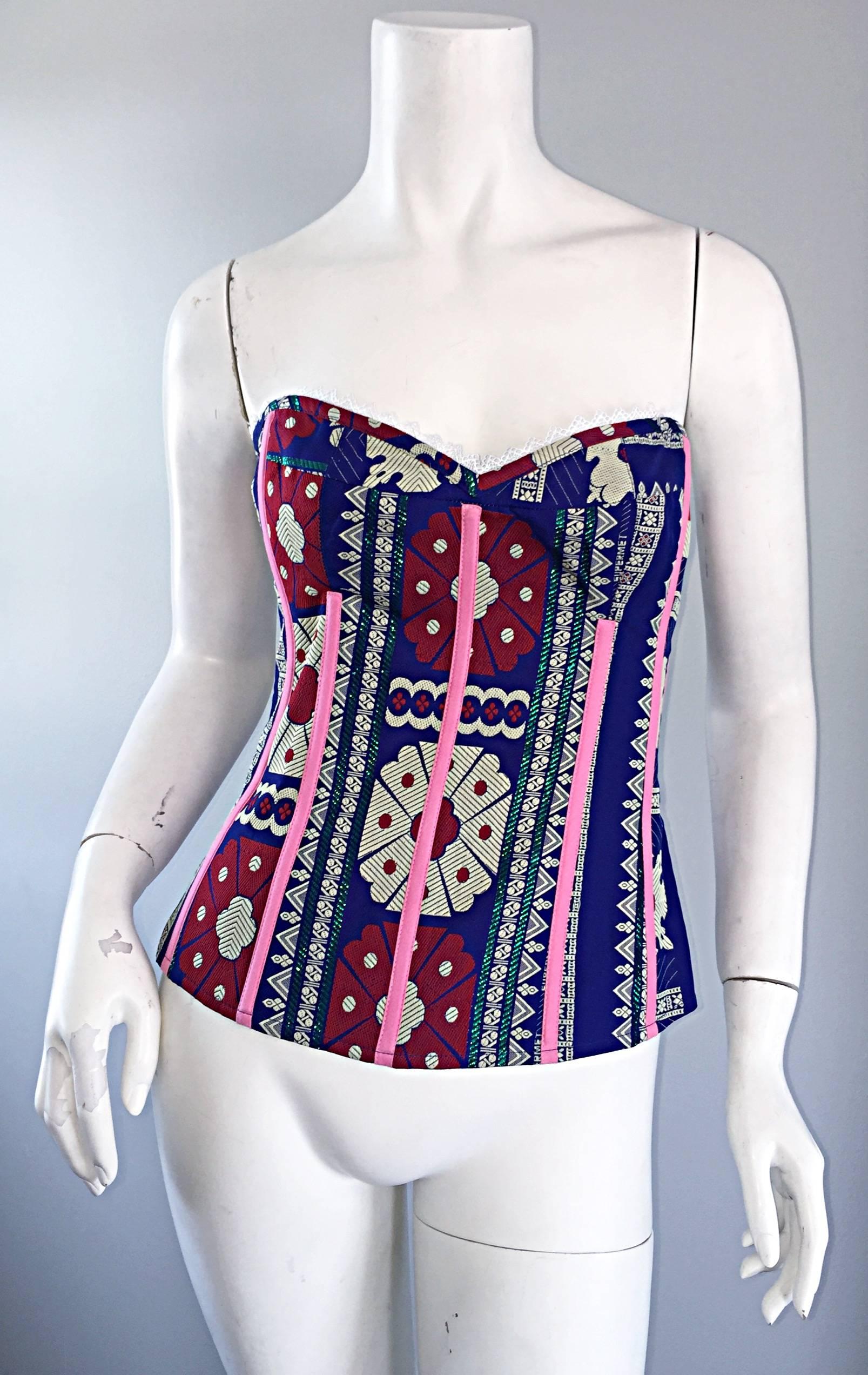 Sexy brand new early 2000s TRACY FEITH strapless corset bustier top! Features colorful silk in vibrant hues of purple, pink, fuchsia, teal, and beige. Chic and stylish Indian themed print, with thin satin vertical panels throughout. Lace trim above