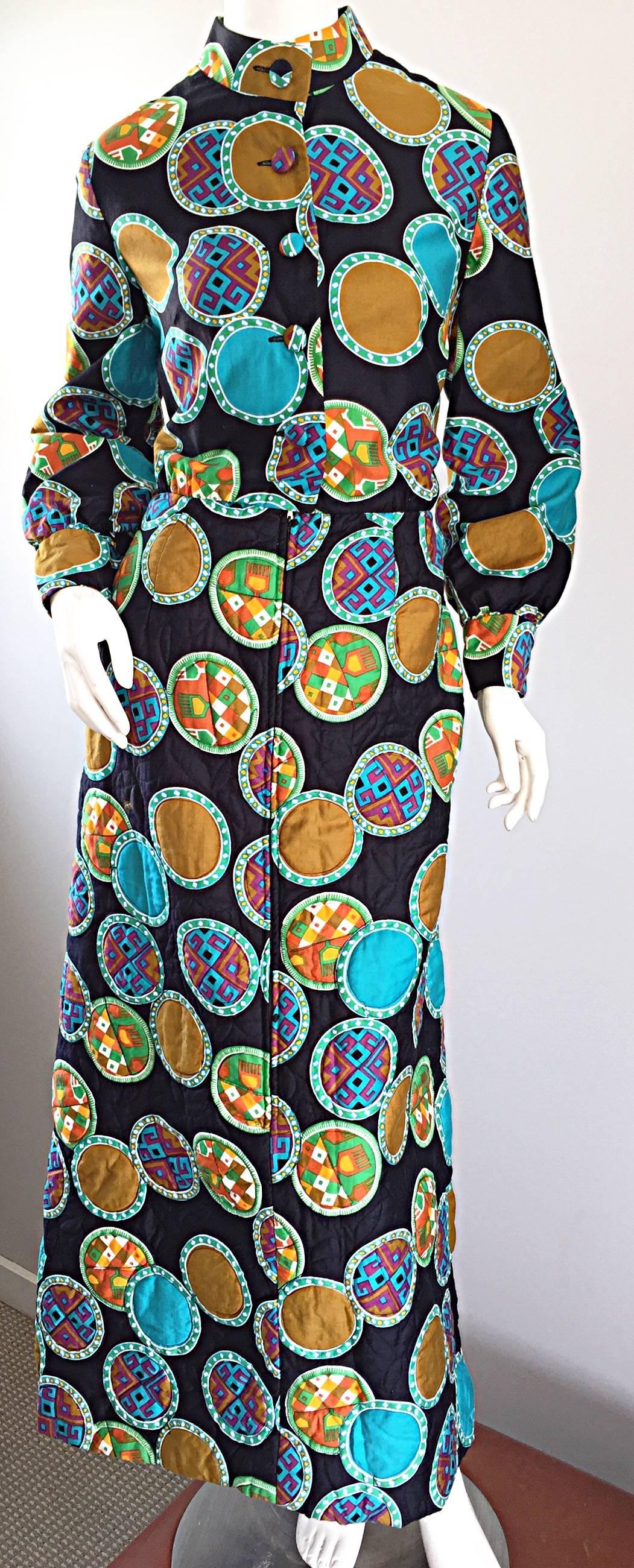 Sensational vintage 1970s DYNASTY for I MAGNIN Chinese inspired colorful cotton maxi dress! Features prints in blues, greens, terra cotta, orange and burnt orange. Fitted bodice, with full sleeves, and a full quilted maxi skirt. Hidden zipper up the