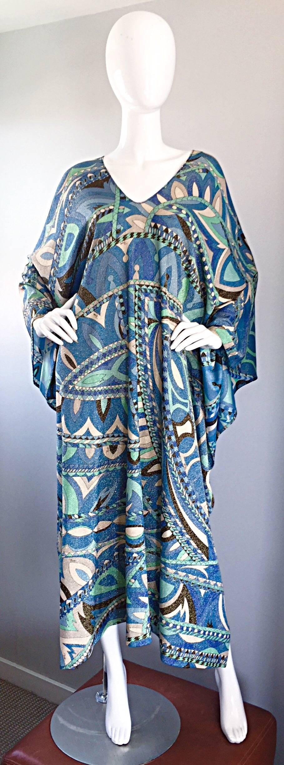 Incredible EMILIO PUCCI metallic kaftan / maxi dress! Features the signature Pucci kaleidoscope print throughout in vibrant metallic blues and greens. Pucci signature throughout. Grecian Goddess fit that drapes in all the right places. Flattering