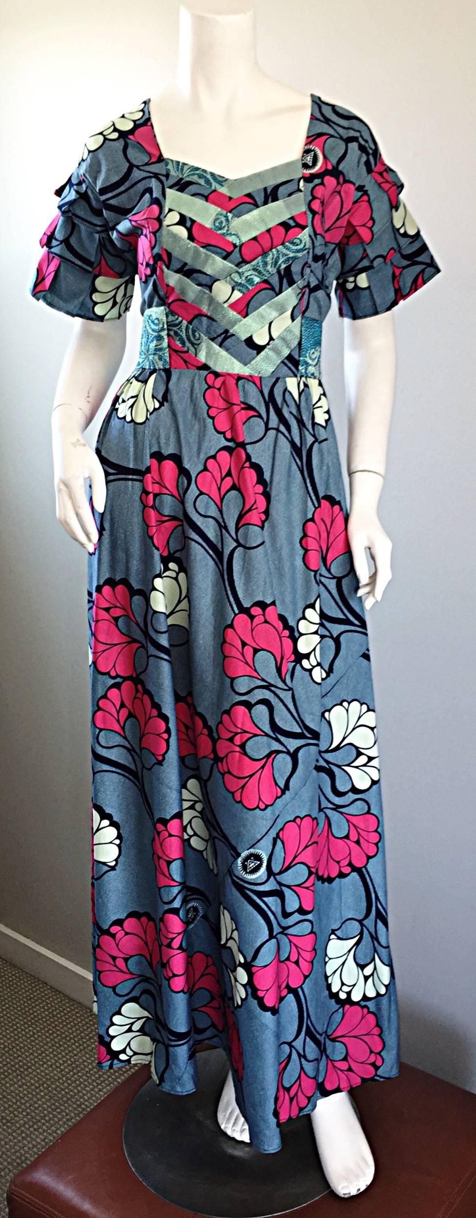 Such a chic 1970s maxi dress! Super soft, yet sturdy cotton fabric, with silk brocade detail at bust, and attached silk brocade belt that ties in the back. Psychedelic themed floral print throughout. Vibrant hot pink mixed with various shades of