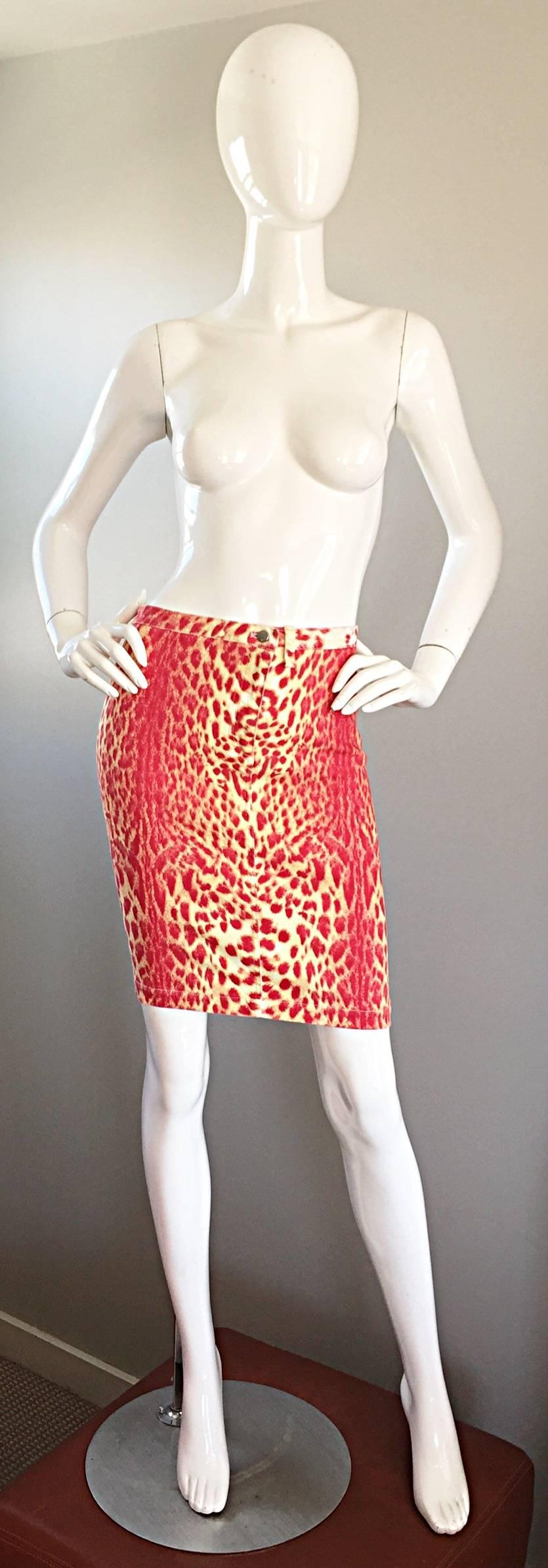 Sexy vintage ROBERTO CAVALLI early 90s red and yellow cheetah / leopard print bodycon skirt! Features an allover animal print. Hugs the body in all the right places. Flattering low rise fit, with button closure at front waist, and zipper fly.