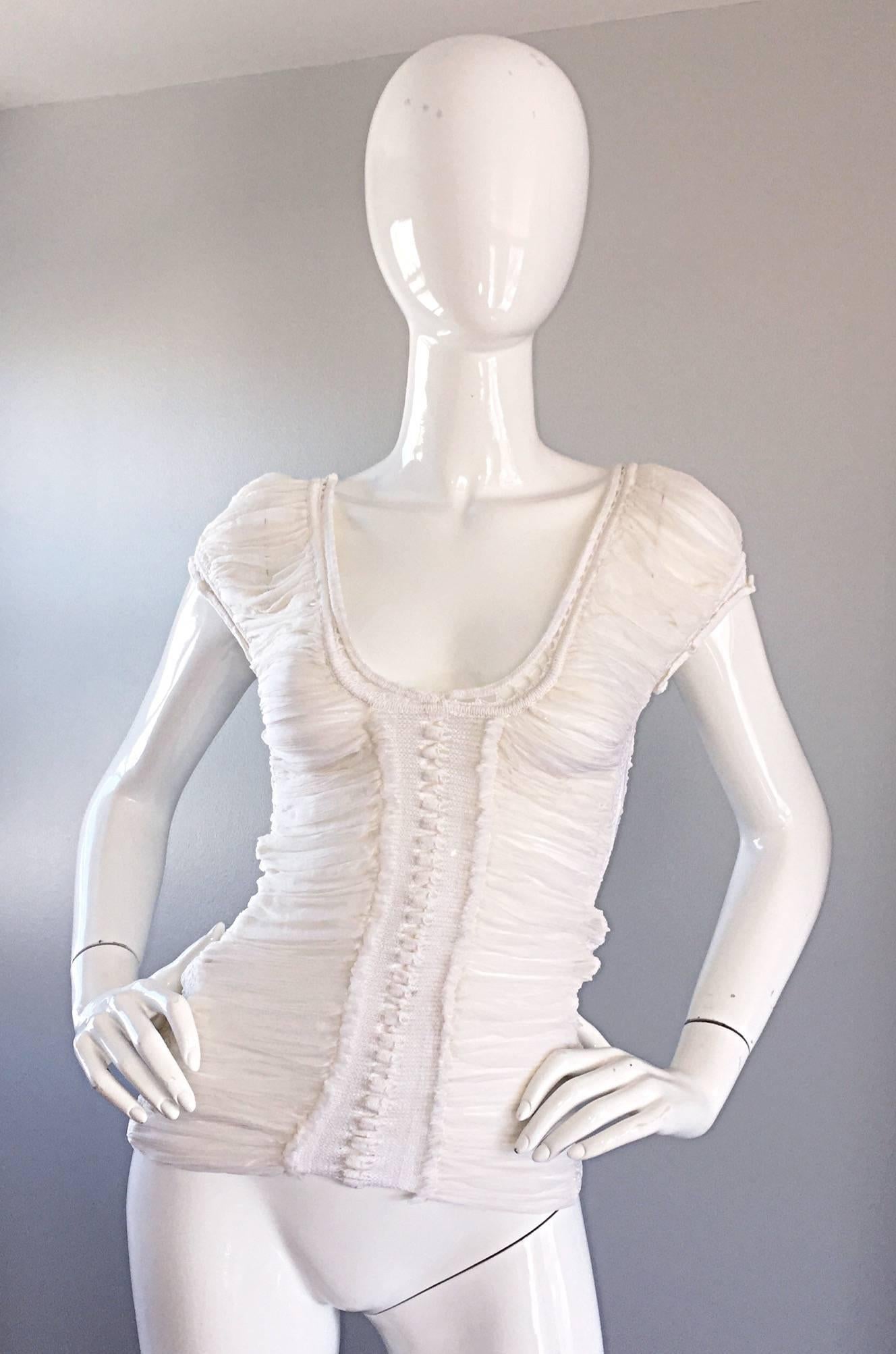 Beautiful 90s ROBERTO CAVALLI stark white silk chiffon and crochet blouse! Features the softest, most luxurious silk you have ever felt! Layers of pleated chiffon, with crochet details at mid bodice, bust and at the cap sleeve trim. Can easily be