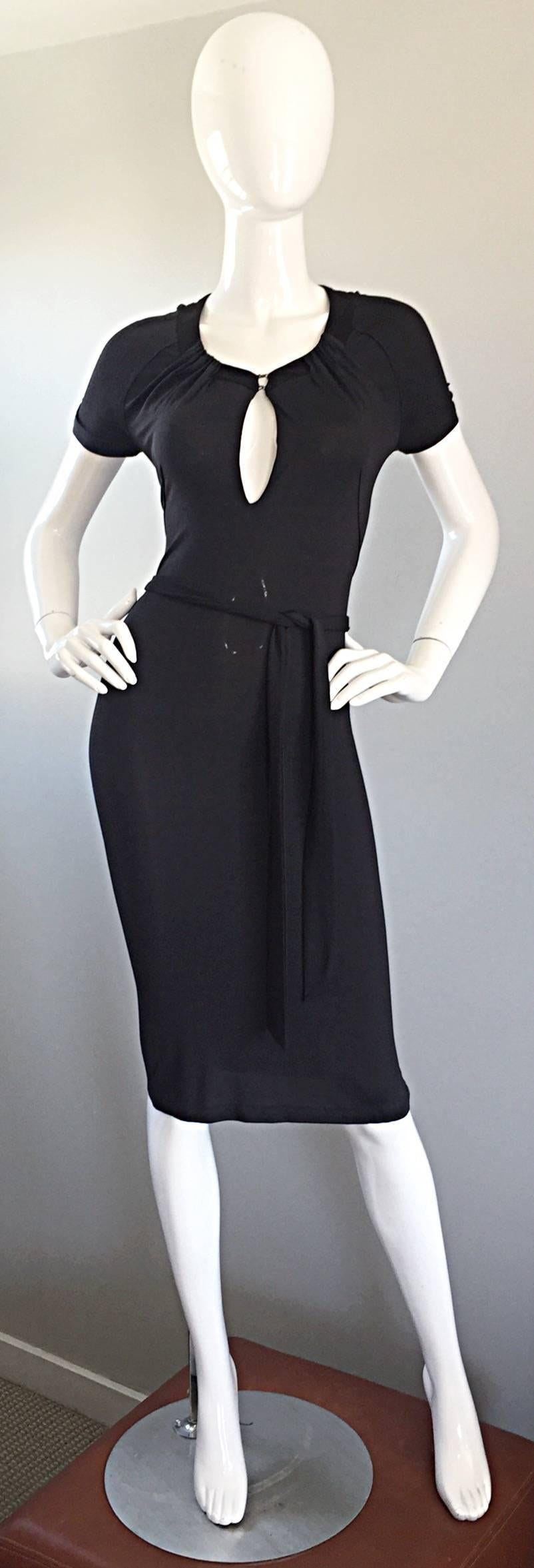 Sexy early 1990s COSTUME NATIONAL jersey keyhole gray dress! Features matching detachable belt and keyhole neckline that can also be left open. Intricate and flattering ruching detail at neckline. Flaterring body hugging fit! The perfect alternative
