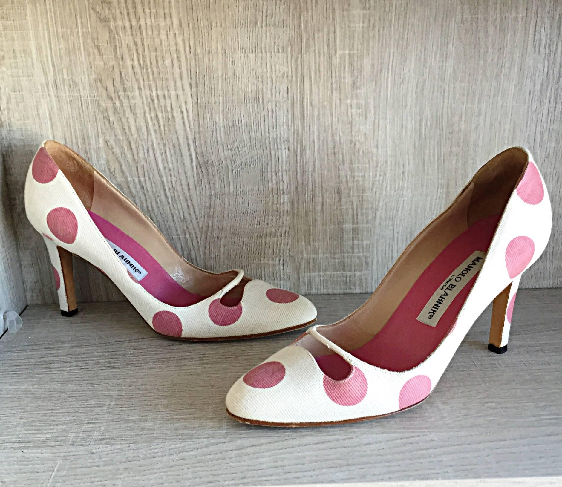 Chic early 2000s MANOLO BLAHNIK pink and white polka dot heels! These shoes look to have been worn once at most--most likely just tried on. Construction on these beauties is nothing less of amazing! Sensible 3 inch heel evokes class and sex appeal.