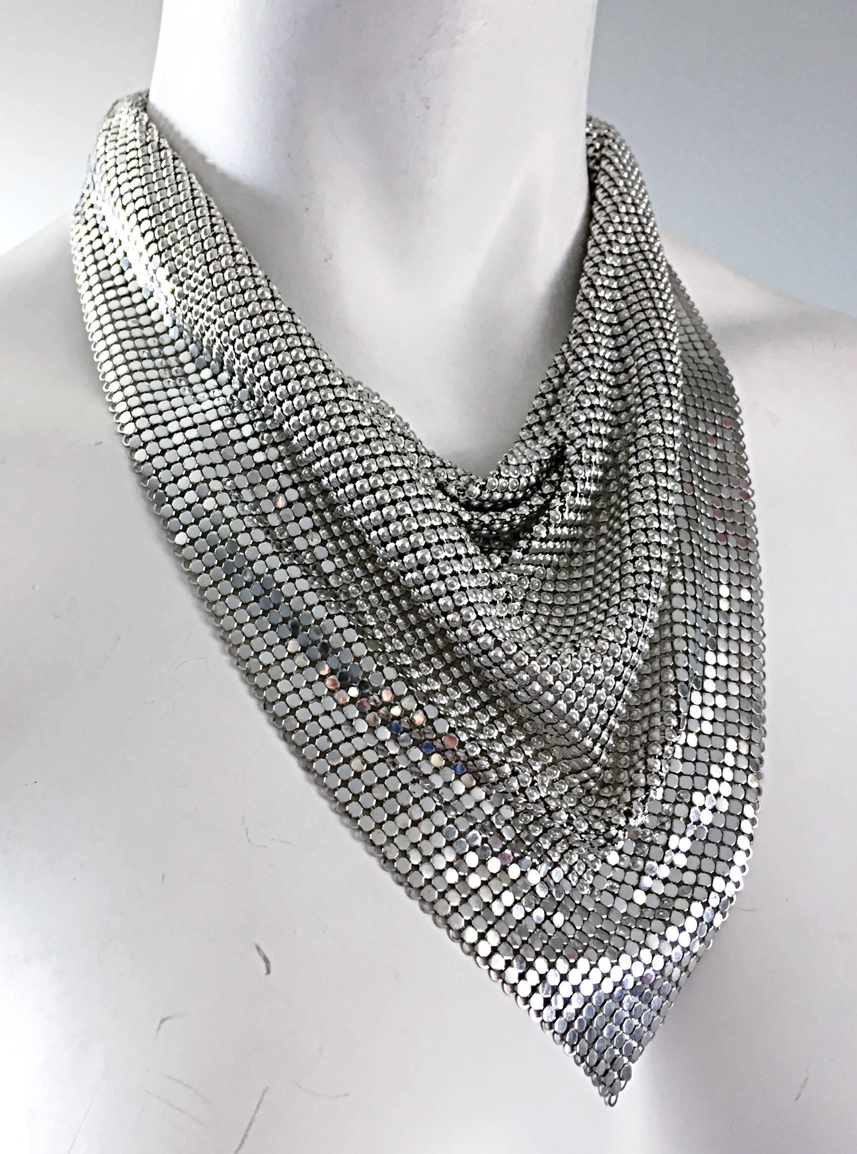 Rare vintage 1970s WHITING & DAVIS silver chainmail bib necklace / choker! Features all over silver metal mesh in a triangular shape. Can be worn for multiple occasions, and can easily be dressed up or down. Perfect with the 70s Samir blue metallic