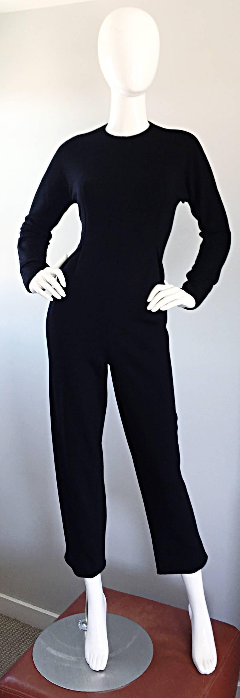 Chic vintage GEOFFREY BEENE for SAKS FIFTH AVE. black wool knit long sleeve jumpsuit / catsuit! Fitted bodice with long tailored sleeves. Super comfortable soft wool knit stretches to fit. The possibilities are endless with this classic gem. Hidden