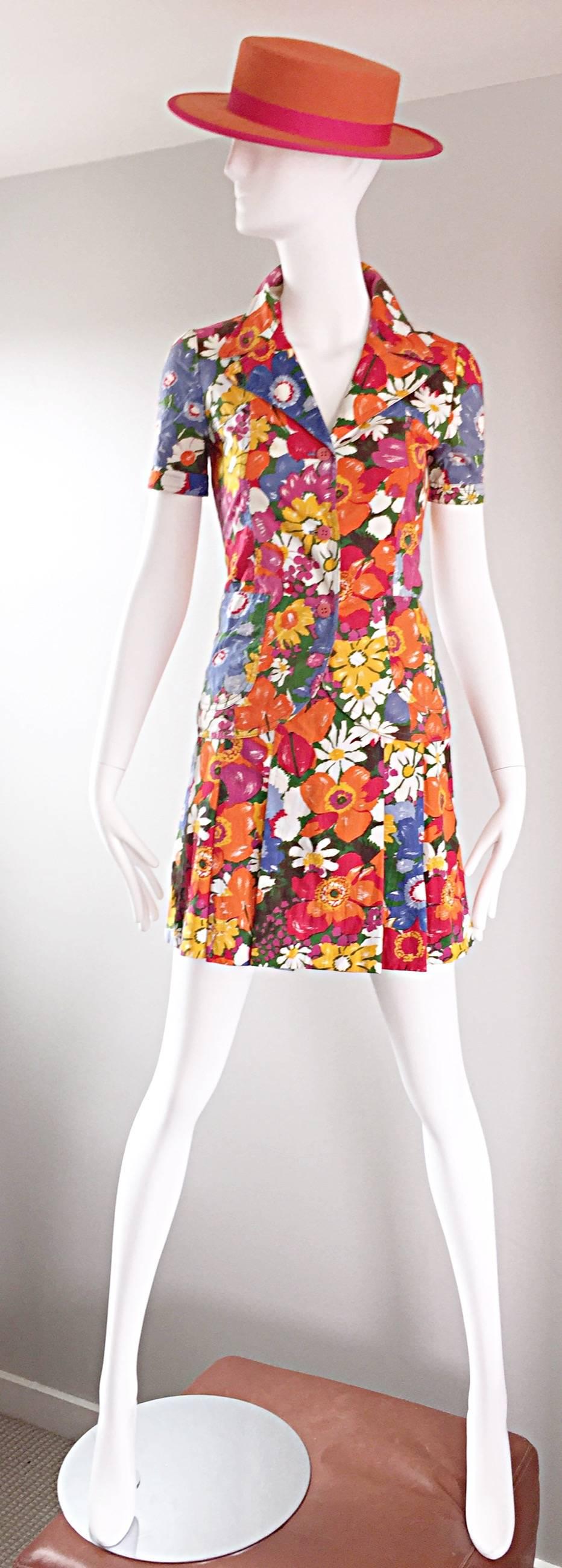 Chic vintage 60s mod vibrant colorful flower print cotton skirt and shirt suit set by French label ZIBAUT! Colorful printed flowers in pink, orange, blue, yellow, white and green (I love the daisies printed throughout). High waisted pleated mini