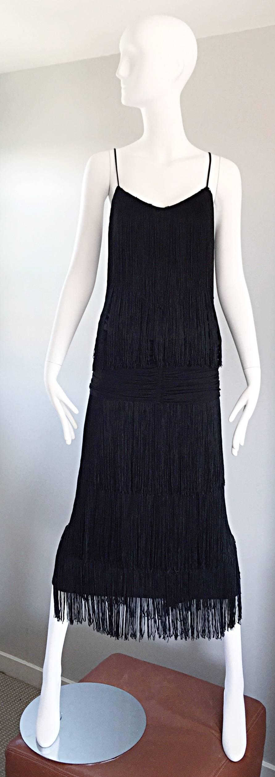 Amazing vintage PAT RICHARDS for I. MAGNIN fully fringed black jersey dress! 1970s does 1920s with this flapper style dress! Features layers of hand-sewn silk fringe throughout the entire dress, with a chic rayon jersey exposed ruched drop waist.