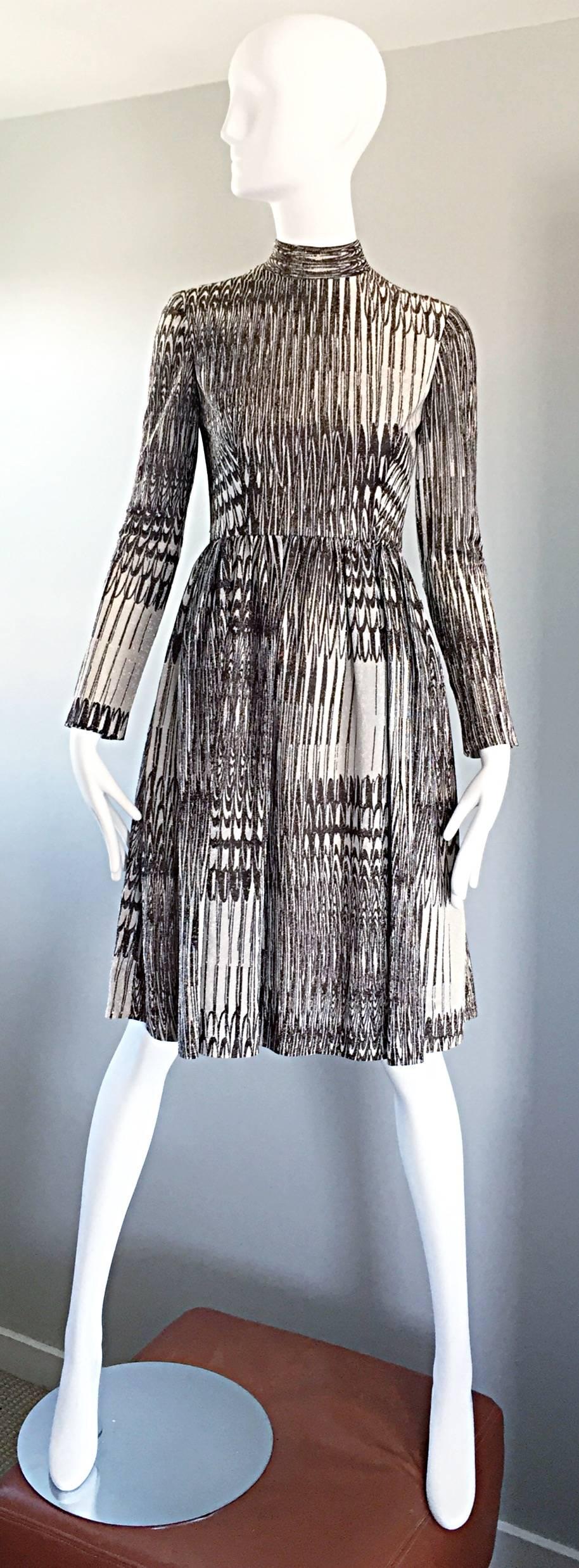 Chic vintage 1960s MOLLIE PARNIS brown, gold, and white metallic lurex dress! Fabulous mod abstract print, with an excellent tailored fit. Slim long sleeves and a mock neckline. Flirty A-Line skirt. Full metal zipper up the back with hook-and-eye
