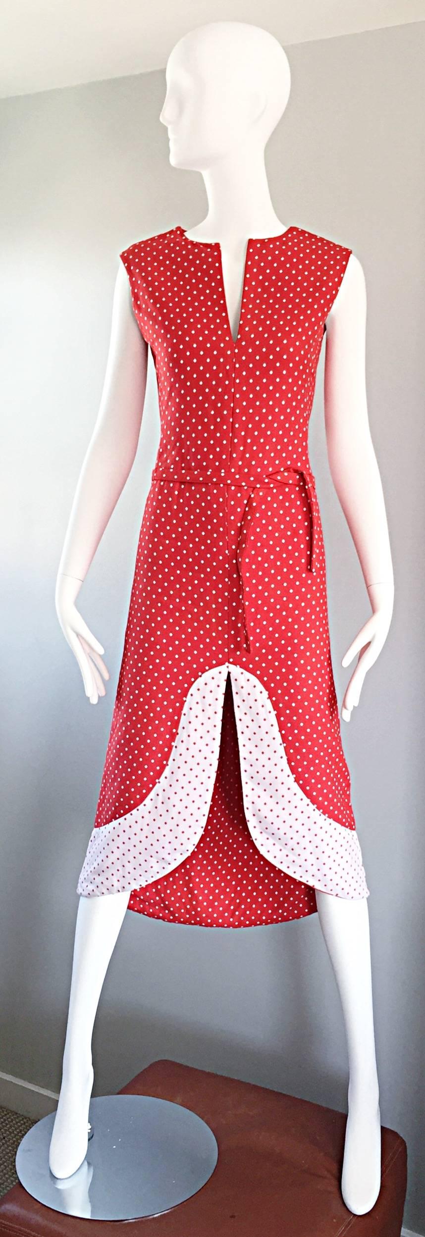 Amazing and super rare vintage 60s PIERRE CARDIN Couture red and white mod dress with sash belt! Heavy duty soft double cotton keeps shape nice, while flattering the body. Tiny polka dot print throughout. Chic Avant Garde cut-out at center hem