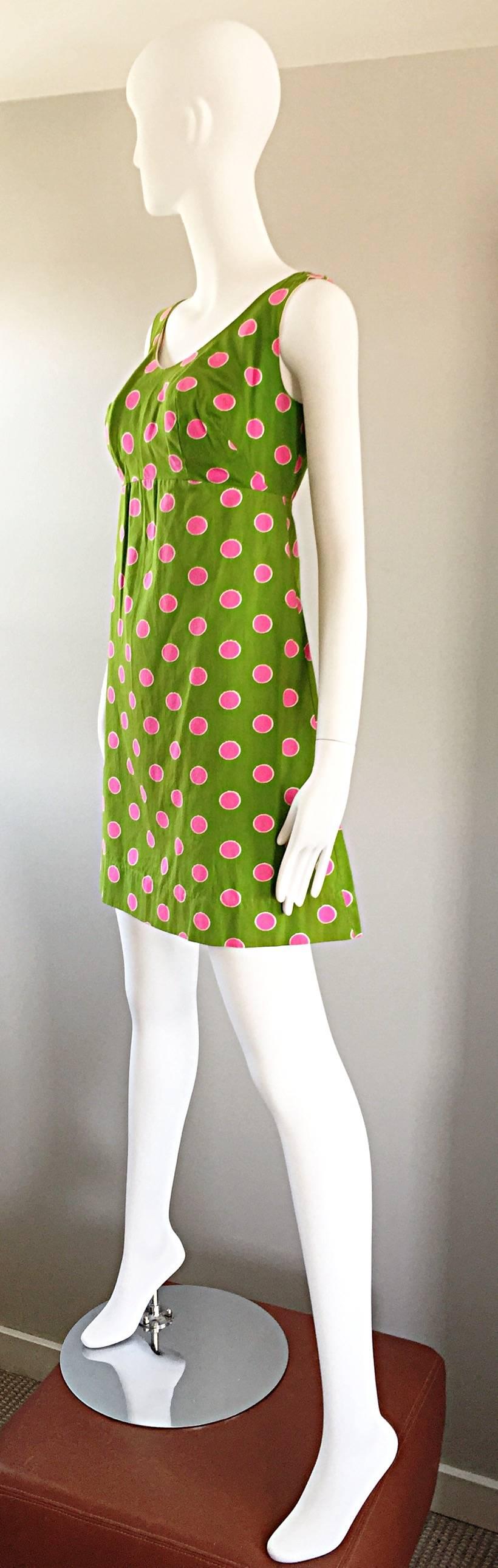 green dress with pink polka dots