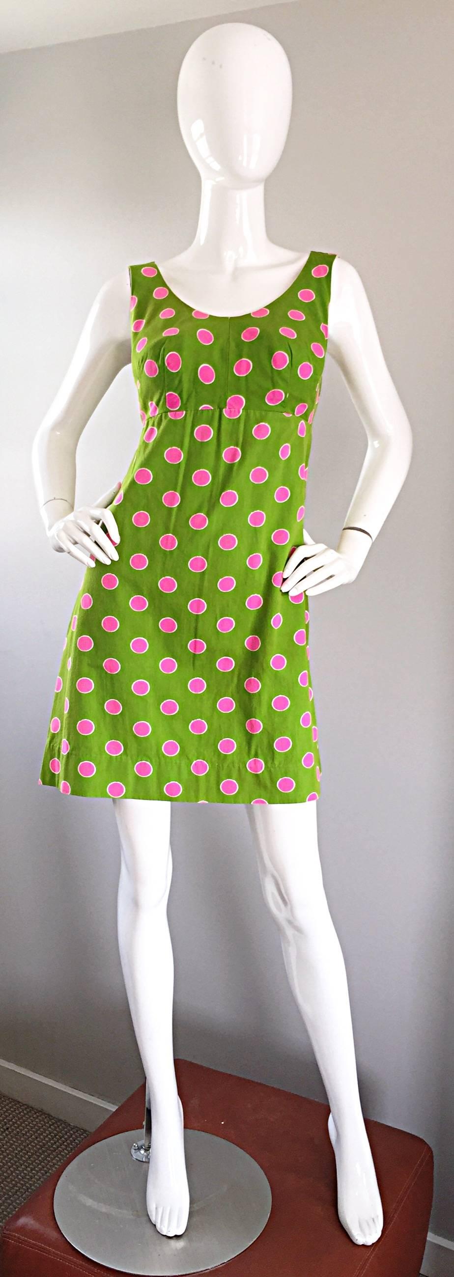 Adorable 1960s chartreuse / lime green and hot pink polka dot cotton mini   A - Line dress! Soft cotton, with a fitted bodice and an amazing A-Line fit and flare fit. Full metal zipper with hook-and-eye closure. Very well made, with no interior