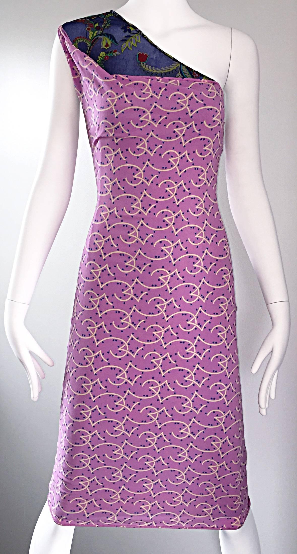 Amazing vintage 90s GIANNI VERSACE COUTURE (Pre Death) one shoulder bodcon dress! Features a purple silk/rayon jersey overlay, with mini stars printed throughout. Underneath is a vibrant royal blue tropical printed semi sheer silk attached toga