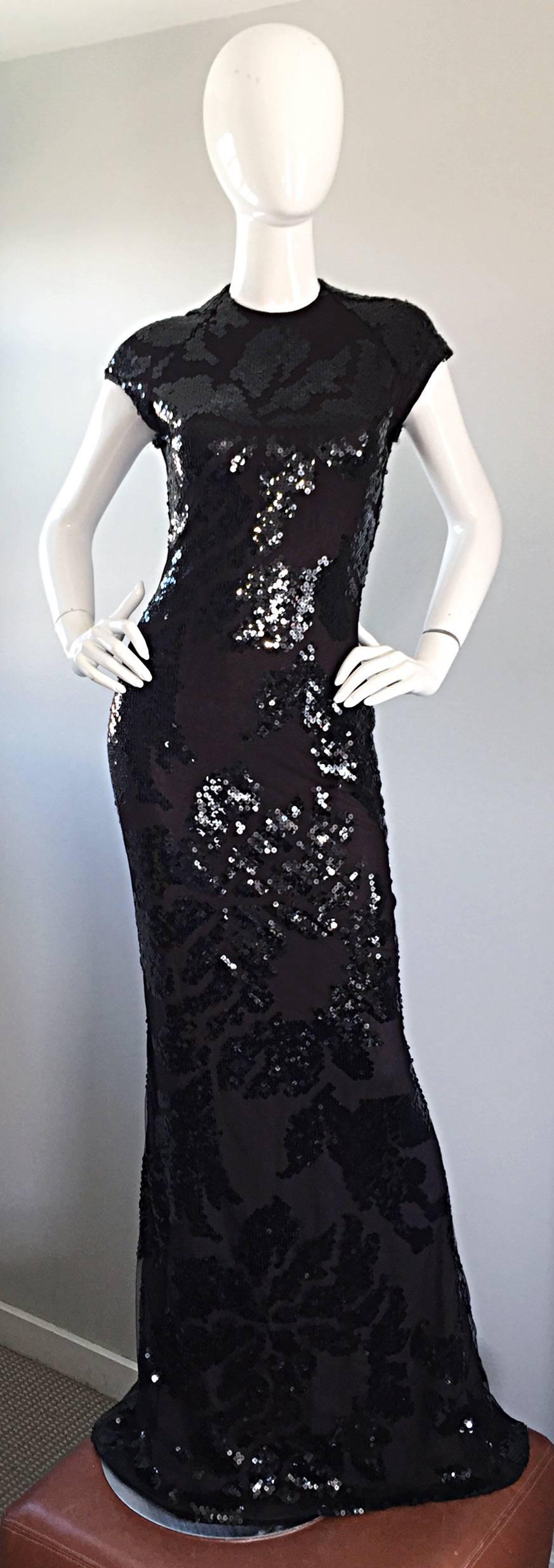 Insanely beautiful, rare, AND important brand new with original $12,000 price tag (would equal well over $20,000 today), this vintage HALSTON Couture gown is truly breathtaking! Black silk with a chic black silk lace mesh overlay. Encrusted with