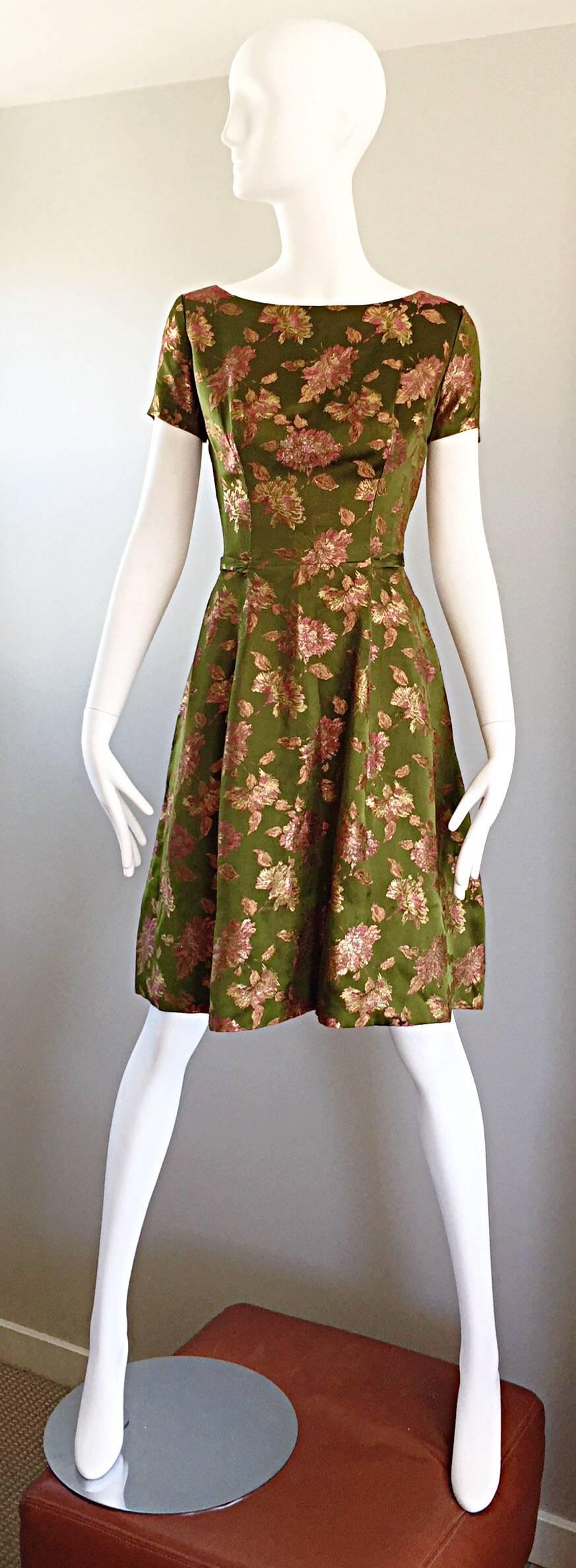 Amazing vintage 50s HOUSE OF BRANELL chartreuse green and pink silk dress and bolero jacket! Incredibly luxurious silk in a beautiful green color with pink embroidered flowers throughout. Cropped jacket with a button at center waist. Dress features