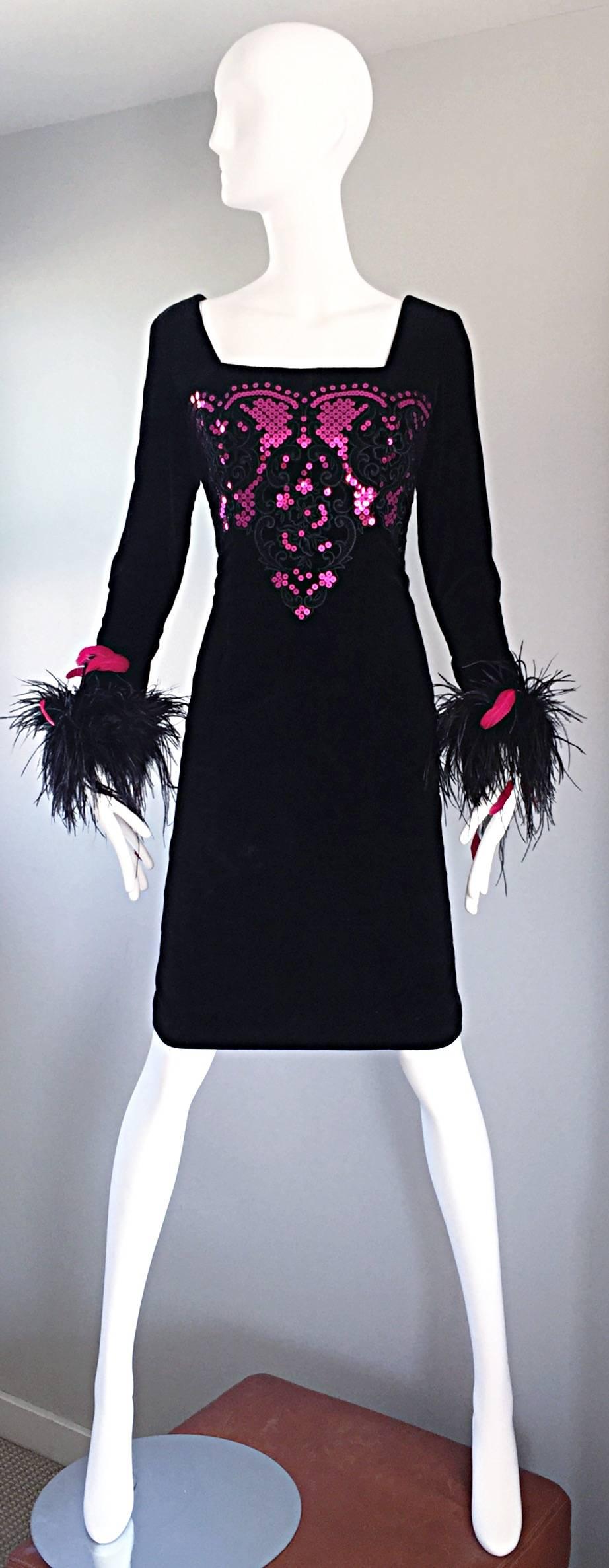Amazing vintage 1970s / 70s ALBERT NIPON for I. MAGNIN black cotton velvet dress! Features an embroidered, encrusted with hundreds of hot pink fuchsia sequins throughout the front and back of the boned bodice. Pink and black ostrich feathers at the