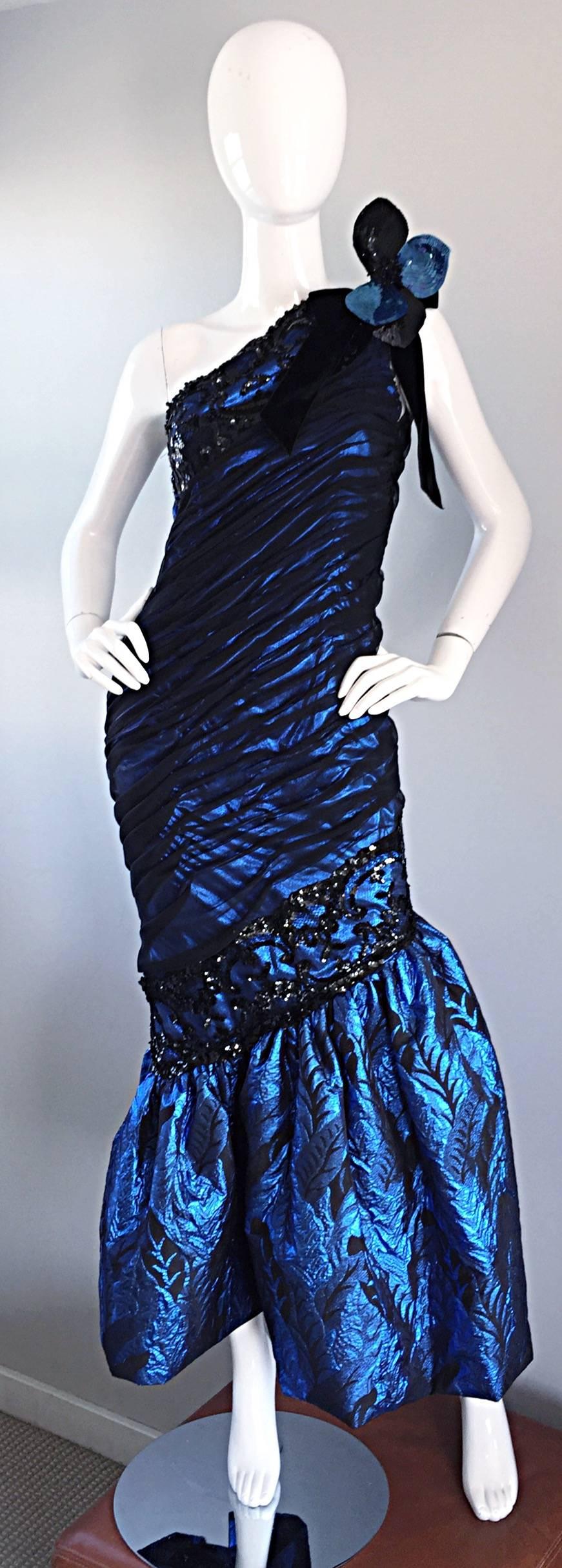 Extraordinary vintage 1980s ANN LAWRENCE Couture royal blue and black one shoulder silk evening dress! Features a beautiful royal blue silk with black chiffon ruched overlay. Mermaid style flared hem in a wonderful royal blue silk brocade, with rows