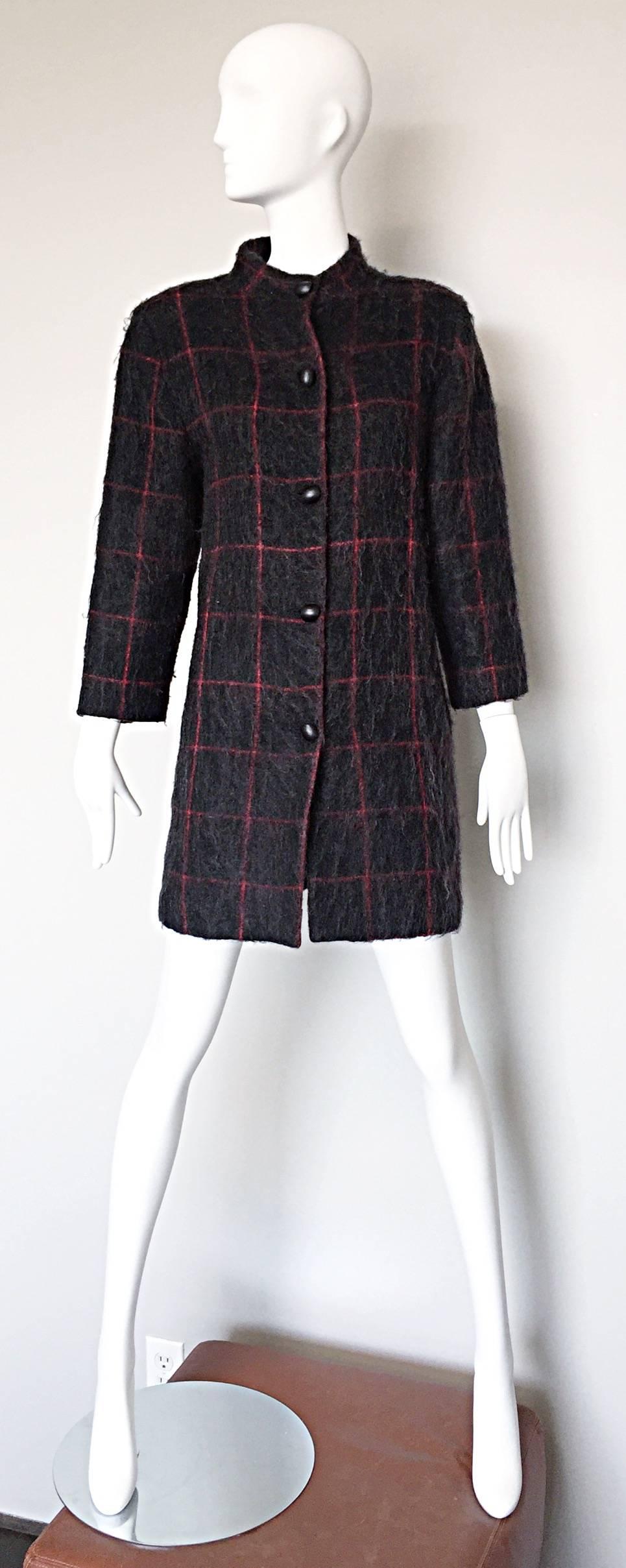 Chic early 1980s GEOFFREY BEENE (Beene Bag) grey and red plaid Swing Jacket! Chic wool and mohair blend with an oversized plaid print throughout. Black lacquer buttons up the front. Pockets at each side of the waist. Fully lined. The perfect