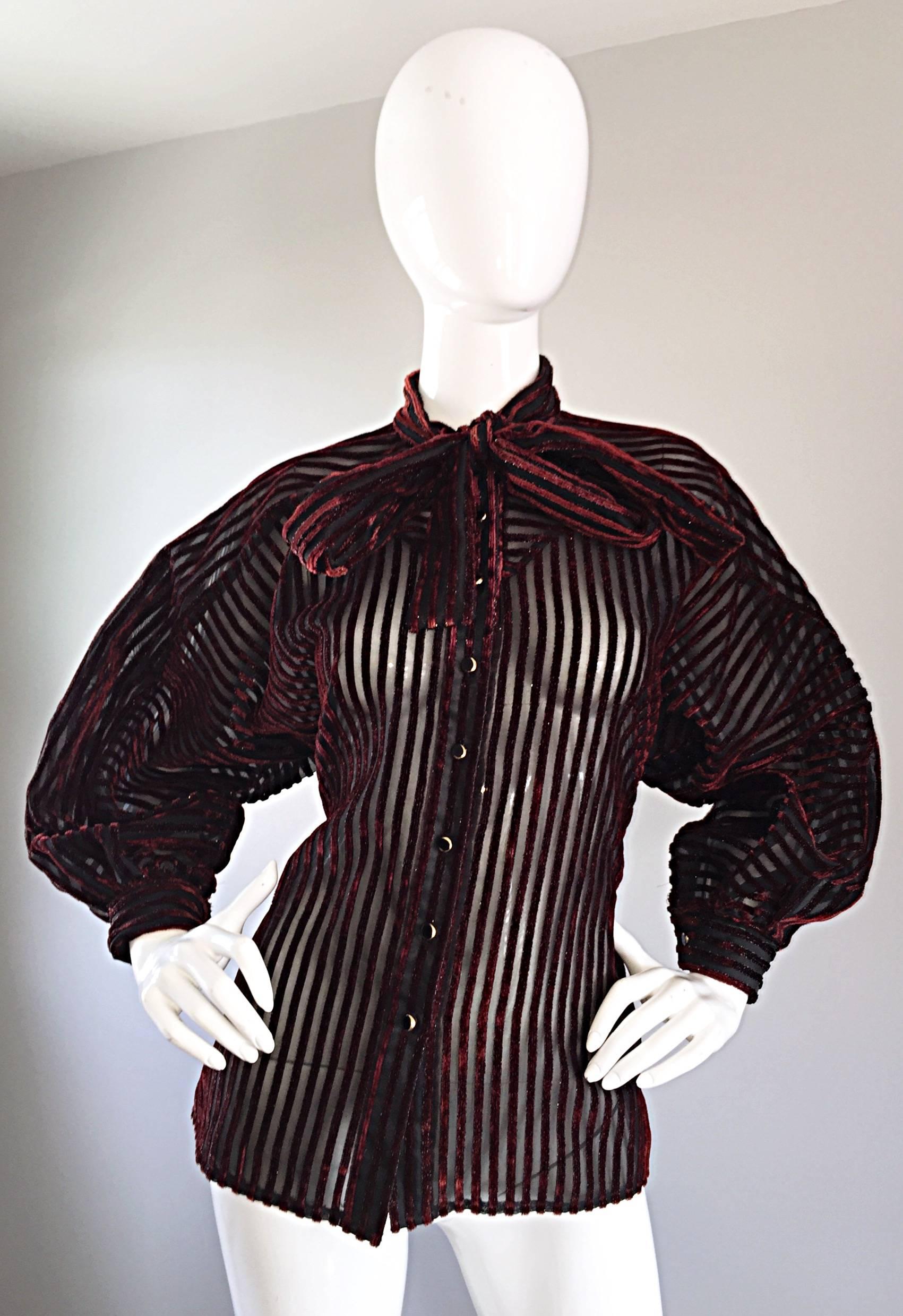 Beautiful vintage NINA RICCI Couture black and maroon silk and burn-out velvet pussycat bow blouse! Features wonderful full bishop sleeve with buttons at each sleeve cuff. Buttons up the bodice. Black silk chiffon with burgundy silk velvet stripes