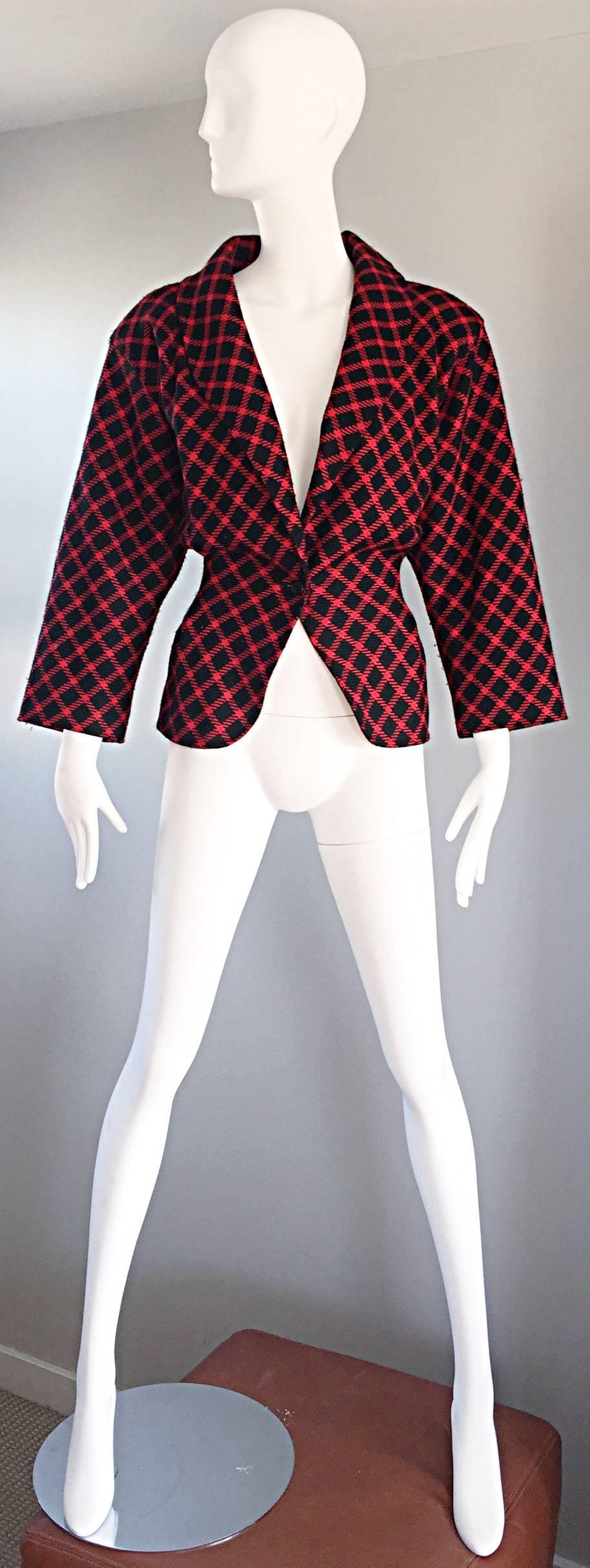 Beautiful vintage EMANUEL UNGARO 80s does 40s black and red plaid wasp waist super soft virgin wool and rayon jacket! Features an allover diamond plaid print. Single button closure at the fitted wasp waist. Shawl collar that can be flipped up or