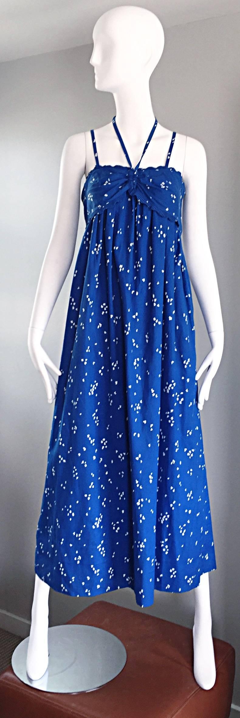Beautiful vintage 1970s BILL TICE for I. MAGNIN royal blue and white hand painted cotton maxi dress! Features an allover hand painted white 'splatter' print throughout. Two spaghetti straps at each shoulder, and an adjustable halter strap that ties