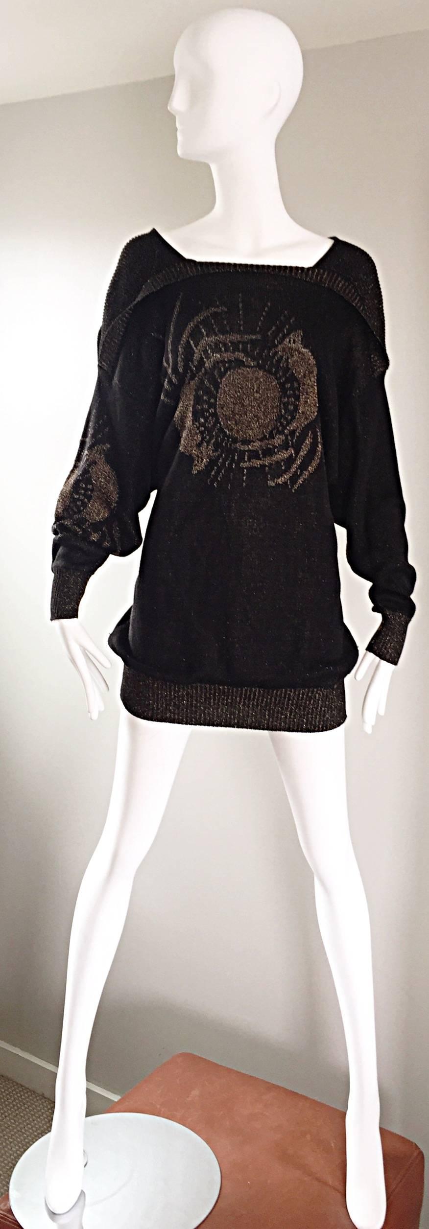 Wonderful vintage TED LAPIDUS HAUTE COUTURE black and gold metallic 'Circle of Life' mini sweater dress or tunic! So much hand-sewn detail went into the construction of this gem. Features a 'Circle of Life' intarsia print on the front and at