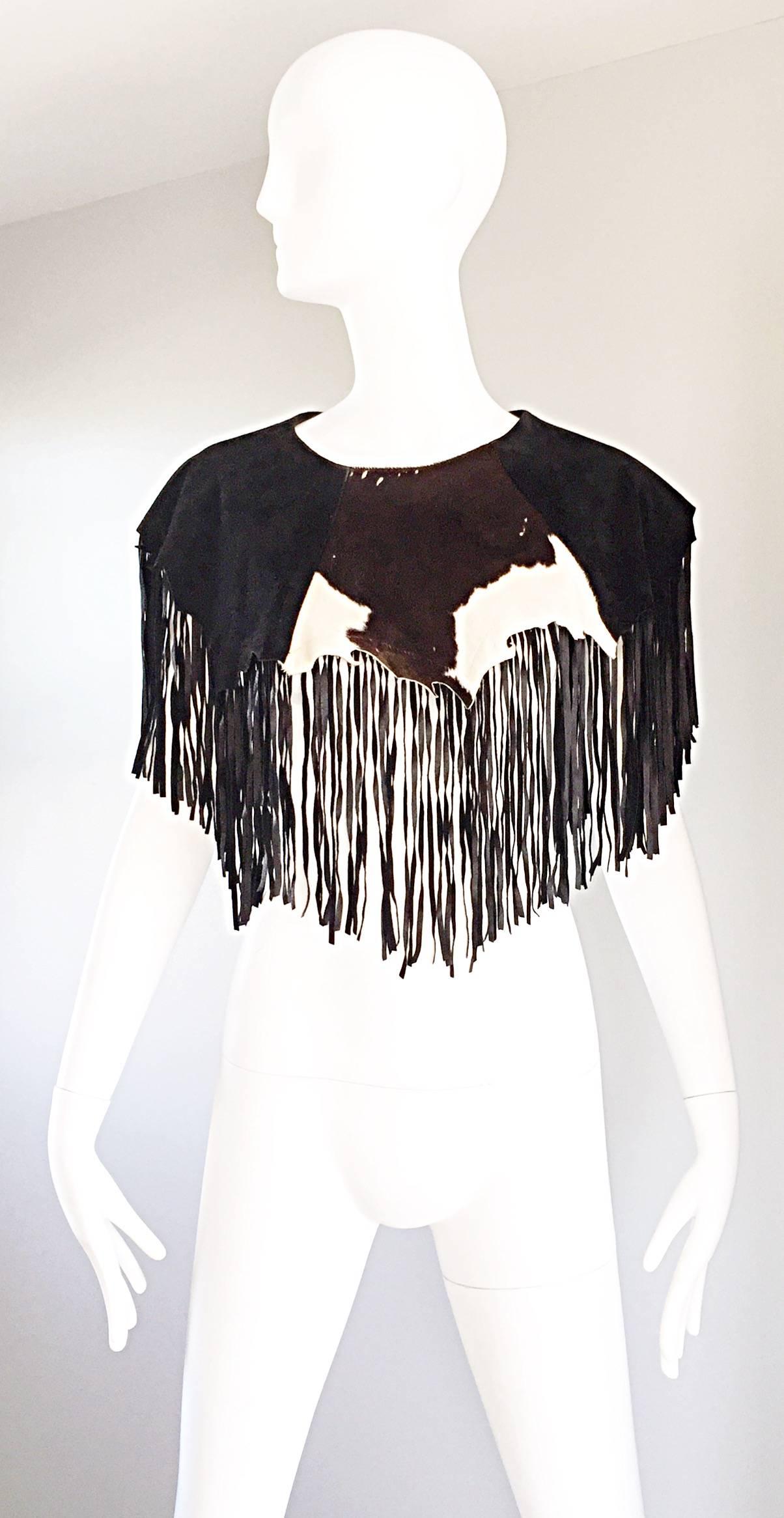 Incredibly chic vintage 1970s 70s RICKY NELL leather, suede, and cowhide leather fringed collar, bib or crop top! Features a brown and white cowhide, brown, and black leather and suede. Perfect over a tank, tee, or by itself. In great condition.