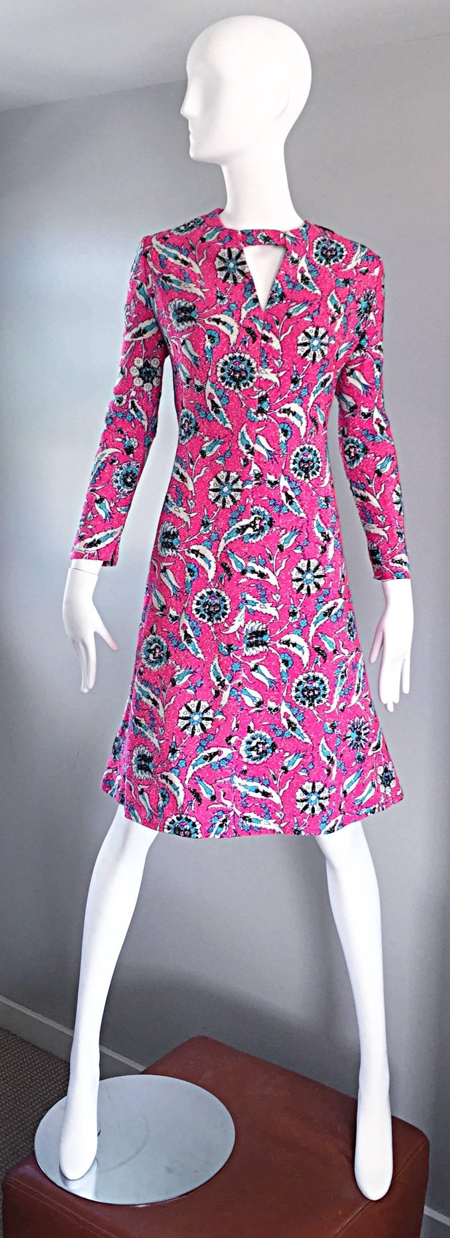 Beautiful vintage 60s ADELE SIMPSON for I. MAGNIN hot pink fuchsia, blue, silver and black lurex knit metallic dress! Perfect A-Line fit that is so chic and flattering. Cut-out above bust adds reveals just the right amount of skin. Long sleeves make