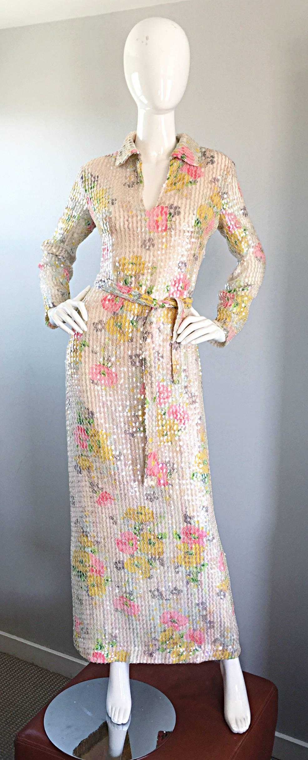 Beautiful vintage 1970s long sleeve iridescent full length fully sequined watercolor floral silk dress. Features a wonderful Allover flower print with thousands of hand-sewn iridescent sequins throughout the entire dress and detachable belt. Hidden
